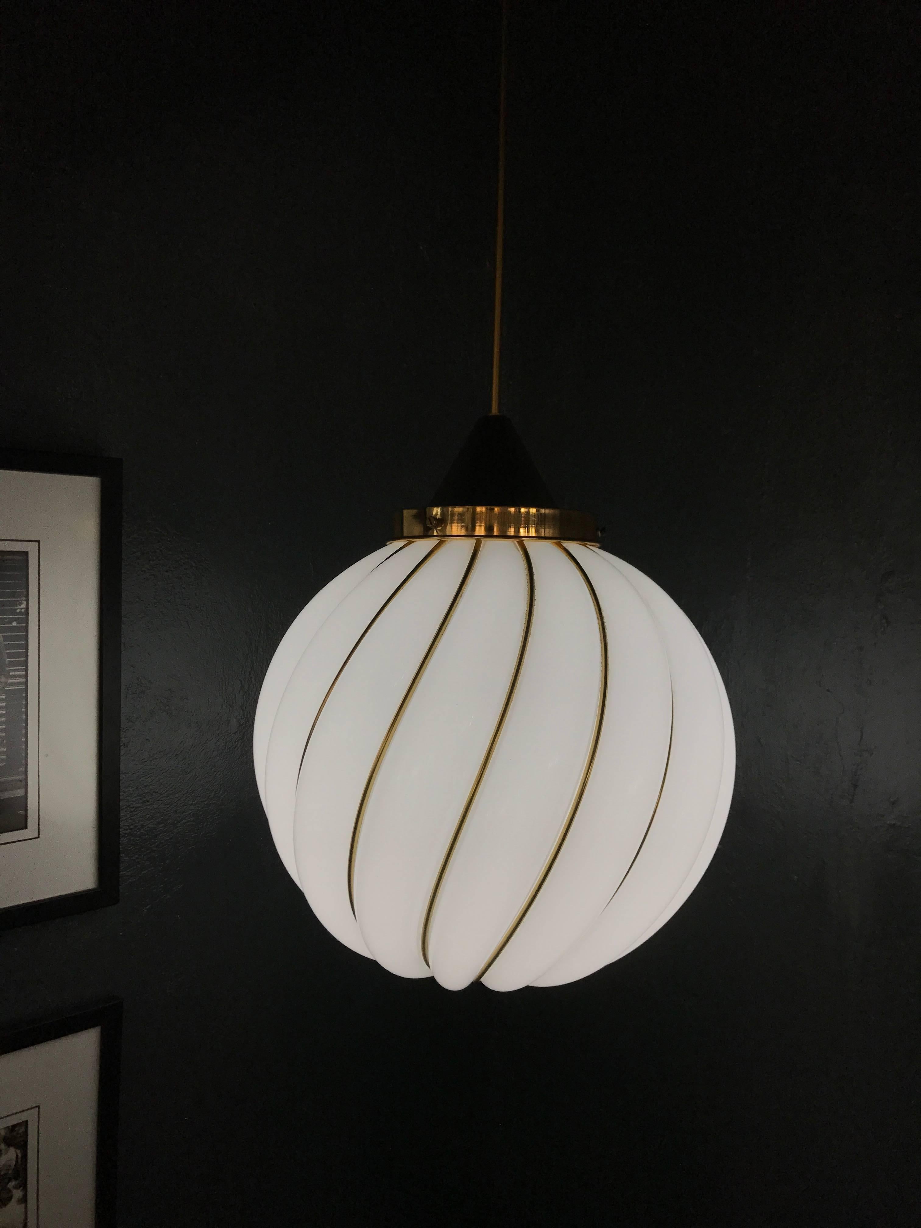 Beautiful pendant light by VeArt circa 1960, based on the design by Adolf Loos in opaline glass and brass.