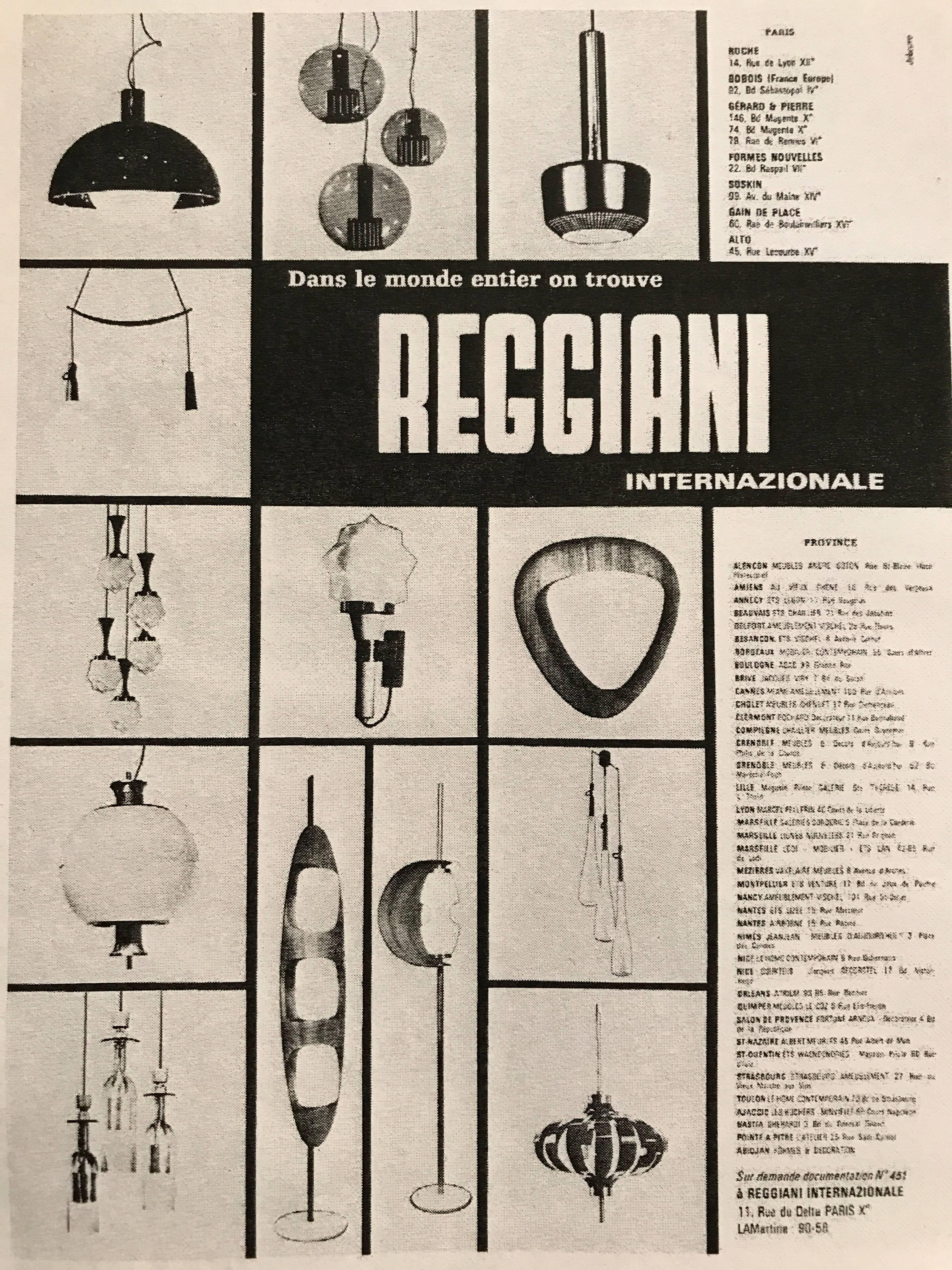 Italian Beautiful Pair of Mid-Century Modern Sconces by Reggiani