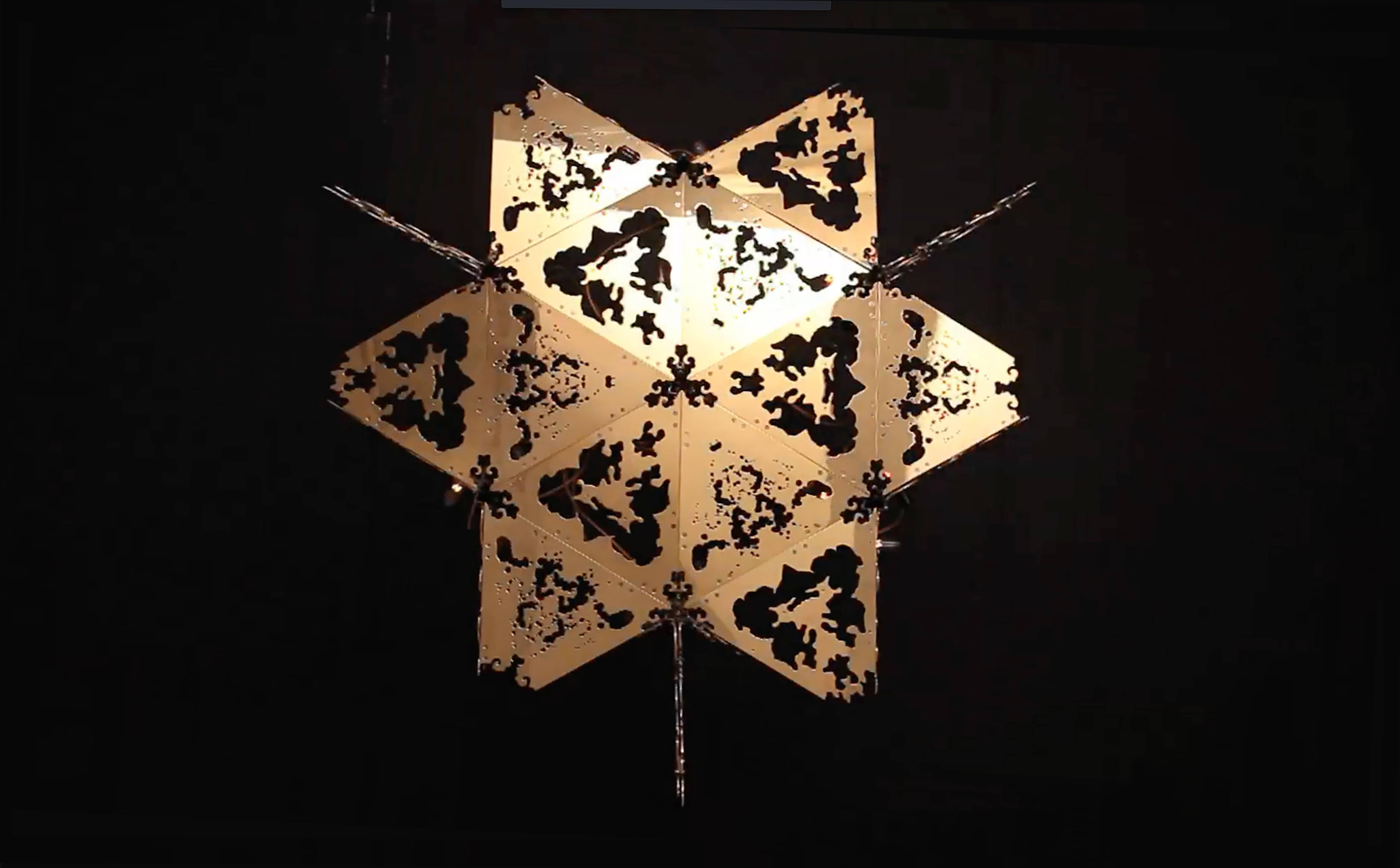 Yakuza Lou is the first in a line of utterly unique Kinetic chandeliers. An expanding origami form that illuminates as it opens, transforming itself and the environment around it. Based on geometric tessellation patterns of equilateral and right