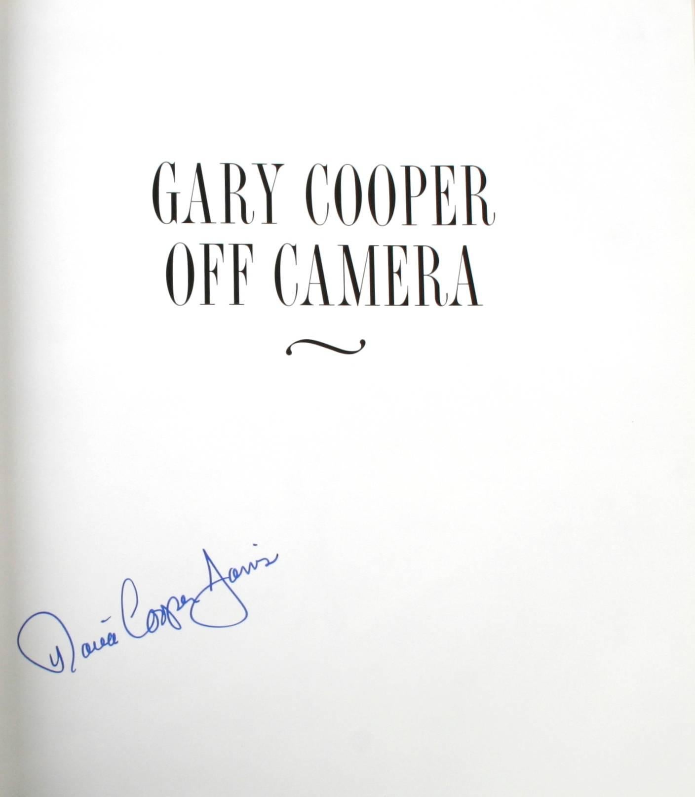 Gary Cooper Off Camera, A Daughter Remembers by Maria Cooper Janis. New York: Harry N. Abrams, Inc., 1999. Signed first edition hardcover with dust jacket. 175 pp. A moving tribute to Gary Cooper by his daughter Maria. Off camera Cooper was a