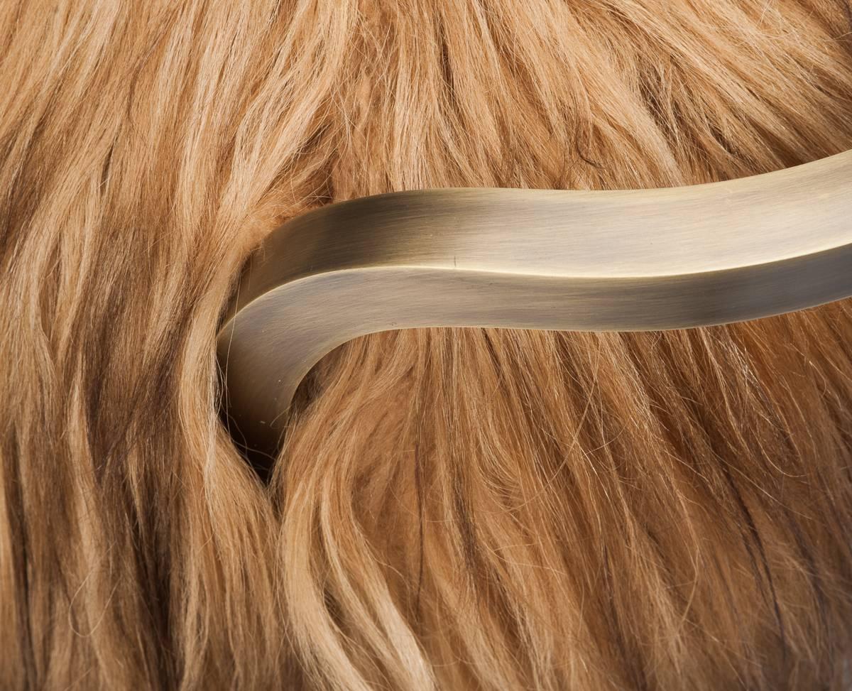 Patinated bronze with Kidassia Fur. Custom colours of Kidassia available upon request. Upcharge will be applied for alternative colours. Standard colour as illustrated in main image.