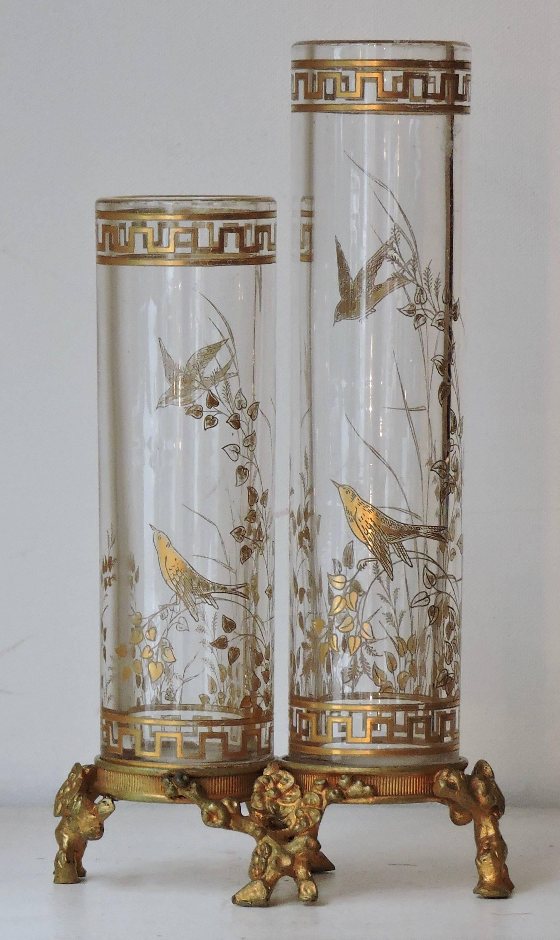 A Maison Baccarat Japonisme gilt painted crystal double vase with ormolu mount
birds and vegetal design
circa 1890.