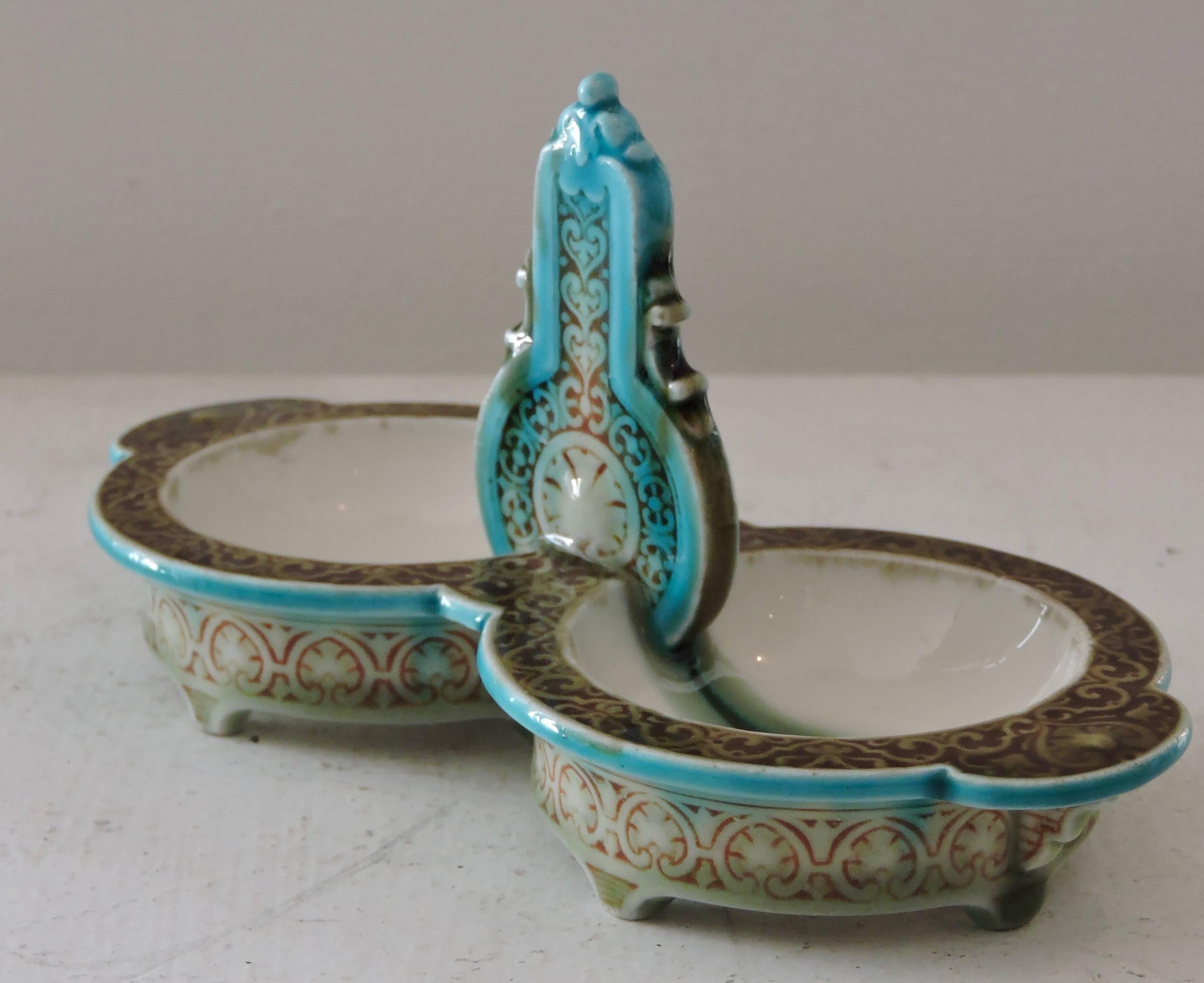 A 19th century Théodore deck polychrome Faience salt cellar.