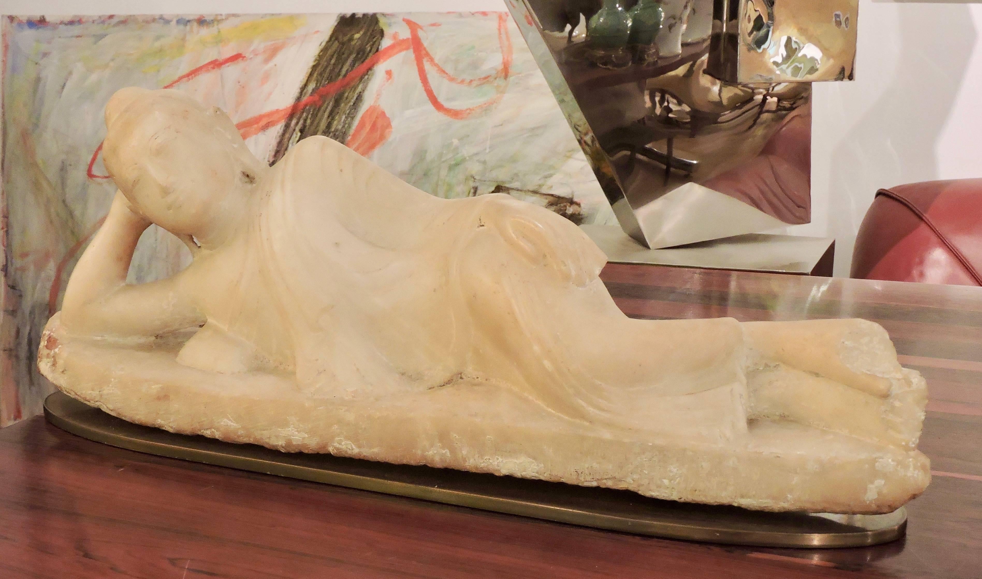 Burma, a 19th century Alabaster reclining Buddha.
Representation of the Buddha lying down during the moment of his Maha parinirvana, one of the popular iconographic patterns in Buddhism as they represent the historical Shakyamuni Buddha during his
