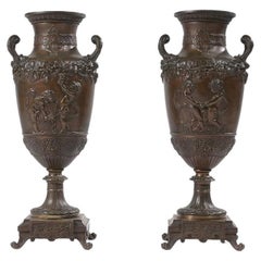 "Les Enfants De Bacchus" a French 19th Century Pair of Neoclassical Bronze Vases