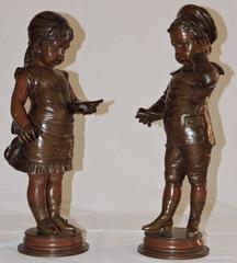 Young Girl and Young Boy a Pair of Patinated Bronze Sculptures by Lecorney