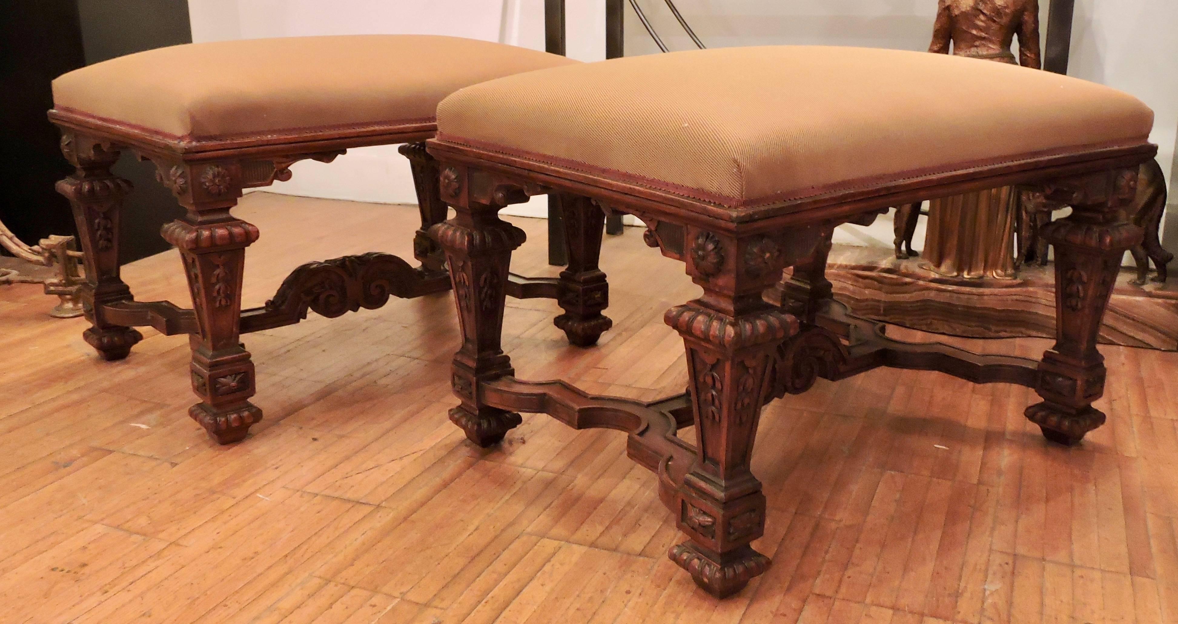 Pair of 19th century Louis XIV style rectangular stools
Four feet in sheaths carved with flowers and gadroons.
