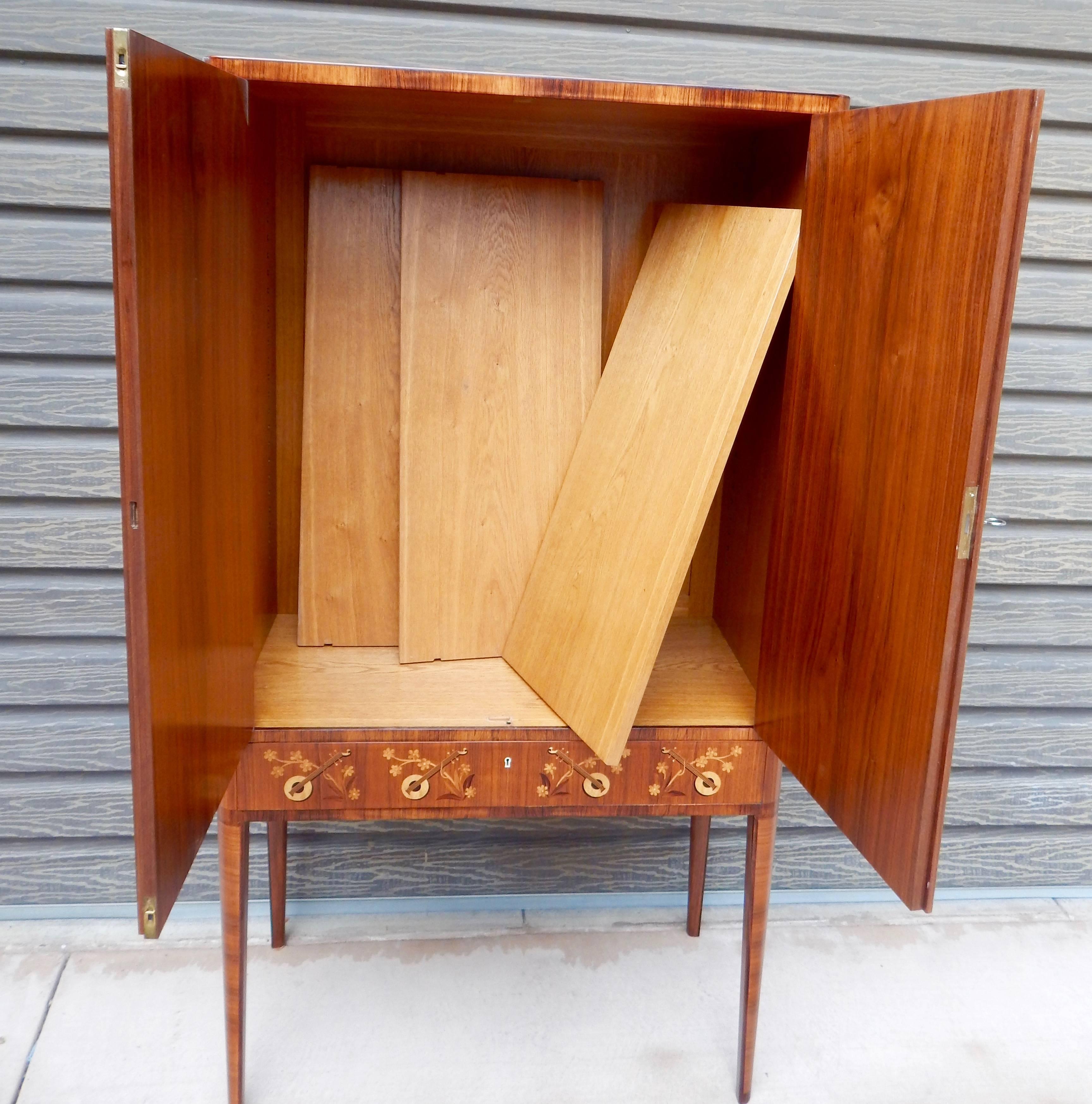 Swedish Art Moderne Storage Cabinet with Inlaid Musical Instruments, circa 1940 In Excellent Condition For Sale In Richmond, VA