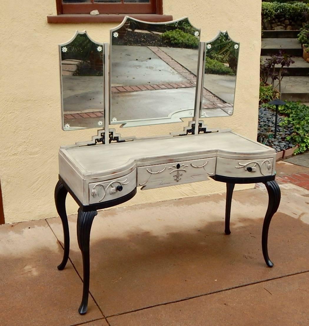 Swedish Grace era, tri-mirrored vanity, painted in the Gustavian manner. Meticulously restored by our craftsmen, circa 1920.