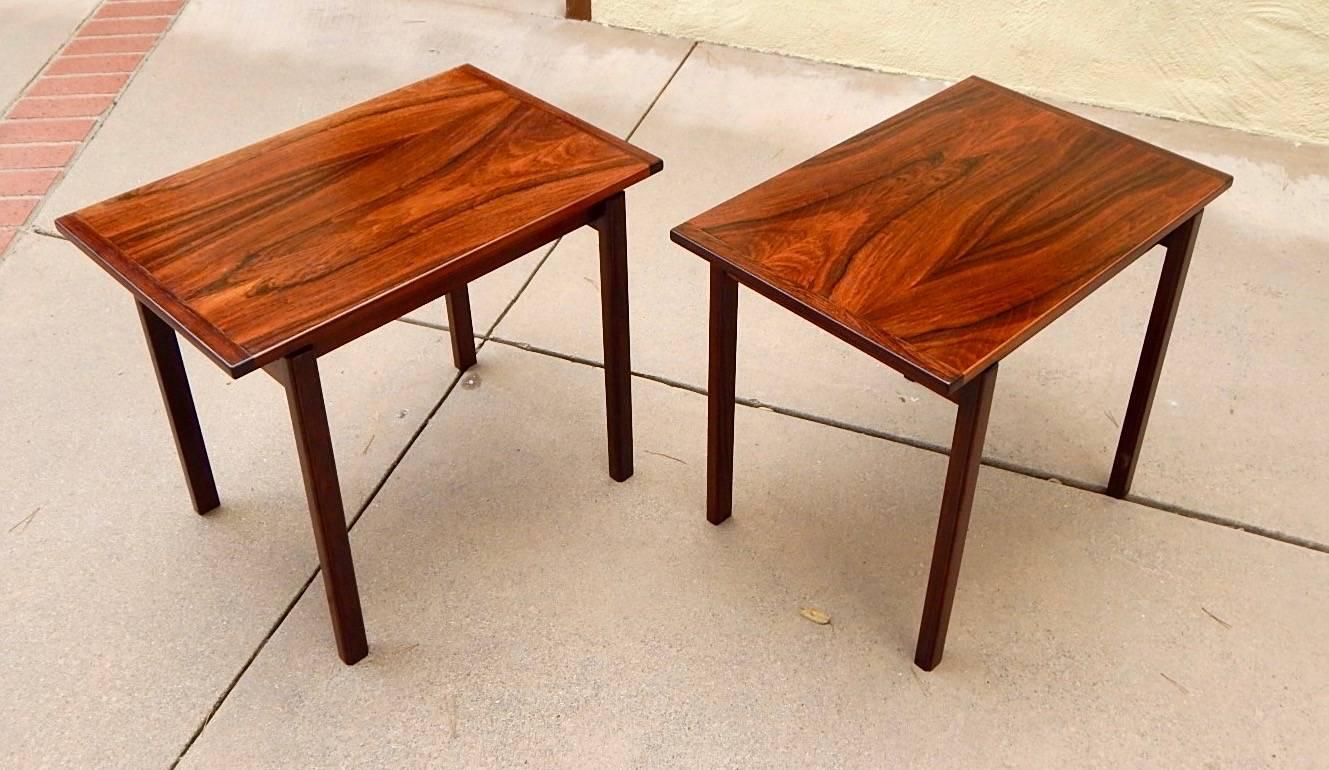 Pair of Swedish Mid-Century Modern side tables by Tiljstrom (brand mark on underside of tables), circa 1960. Rendered in highly figured, bookmatched rosewood. Restored by our woodworkers to their original luster.