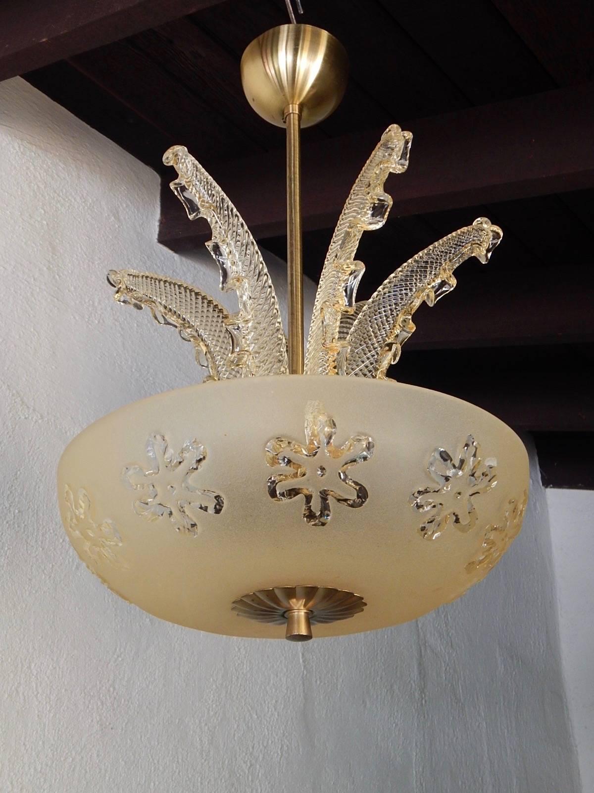 Swedish mid-20th century hanging fixture with six glass leaves. Price includes rewiring. Fixture is in excellent original condition.