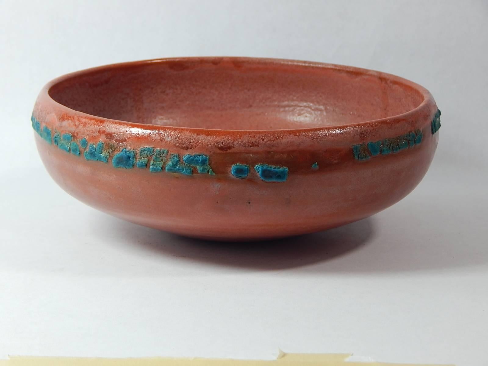 Relicware wheel thrown earthenware bowl by Andrew Wilder # 74. In terra cotta with turquoise lichen glaze and terra cotta colored over glaze . Made by hand in Los Angeles, California 2017.
 