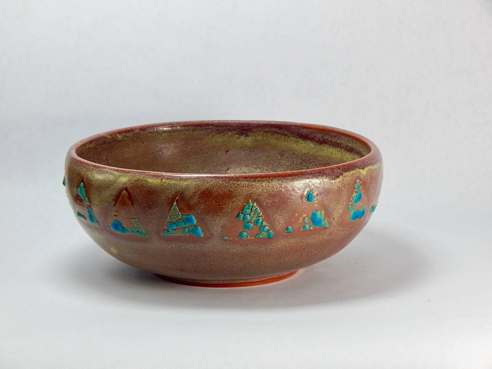 Relicware wheel thrown earthenware bowl by Andrew Wilder # 87. In terra cotta with dark red and mustard yellow glaze and white lichen overglaze . We can produce commissions to order in this series. Contact us for more information. Made by hand in