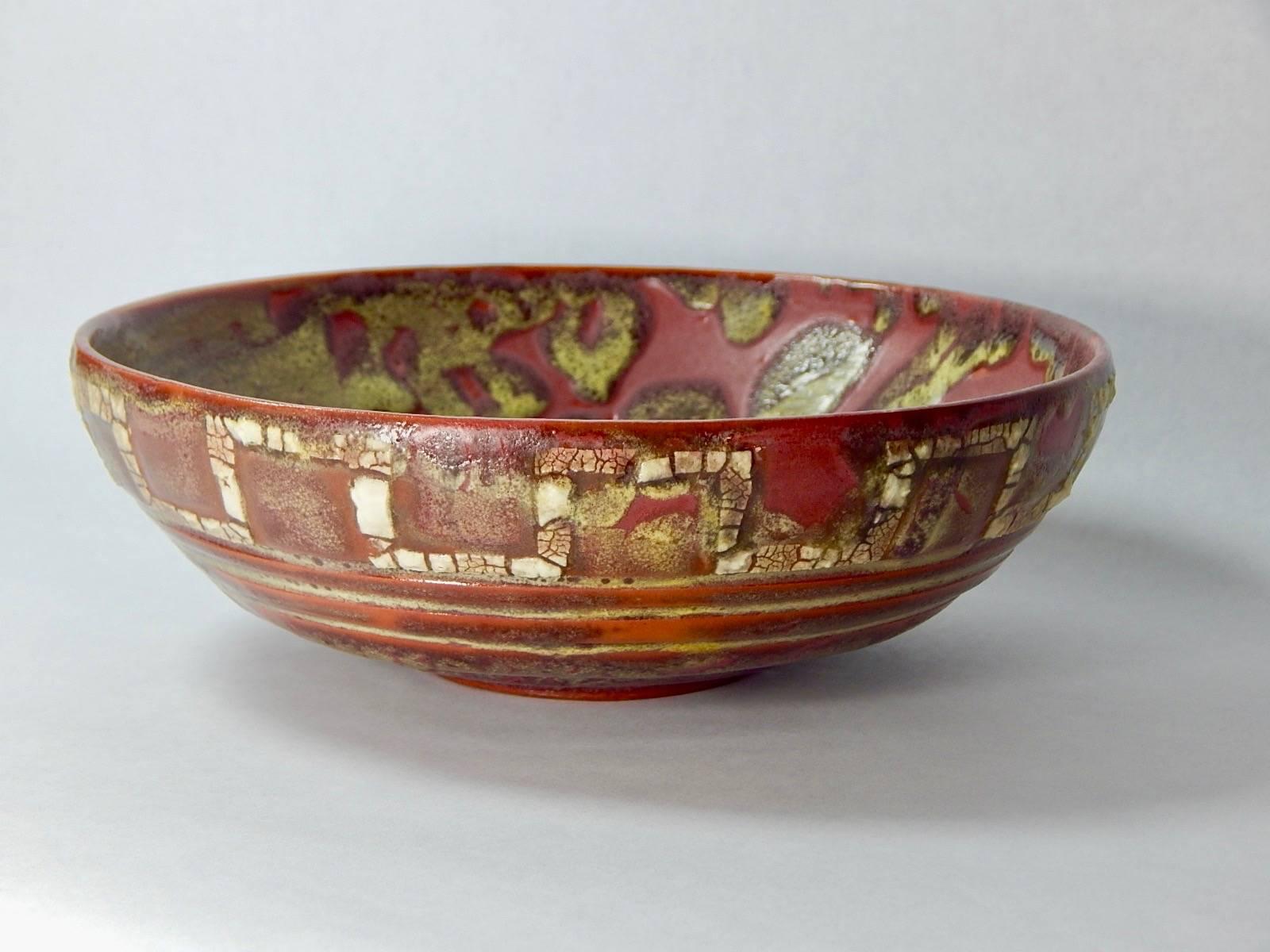 Relicware wheel thrown earthenware bowl by Andrew Wilder # 88. In terra cotta with dark red and mustard yellow glaze and white lichen overglaze . We can produce commissions to order in this series. Made by hand in Los Angeles, California 2017