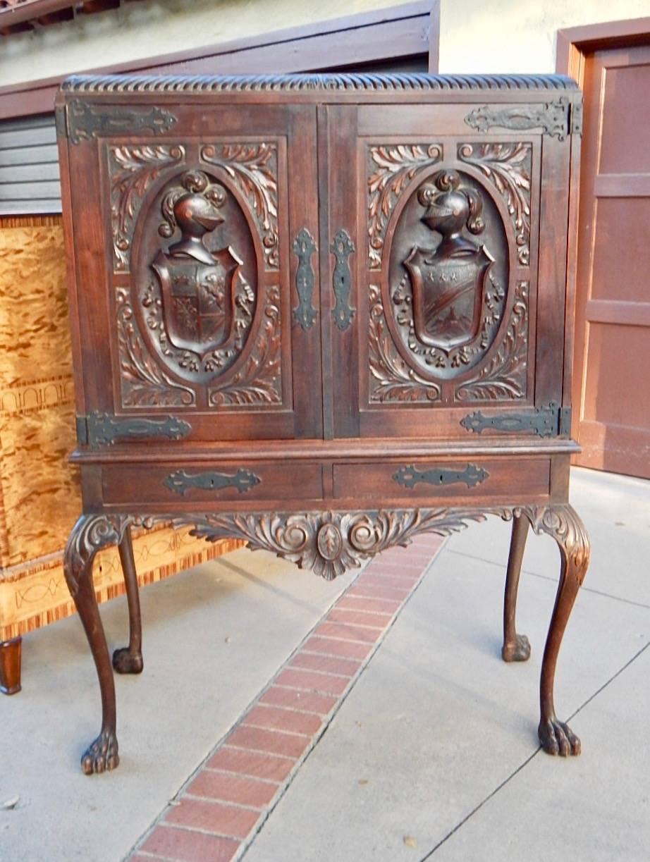 Argentine Spanish Colonial Heraldic Theme Storage Cabinet Circa 1920 In Good Condition For Sale In Richmond, VA