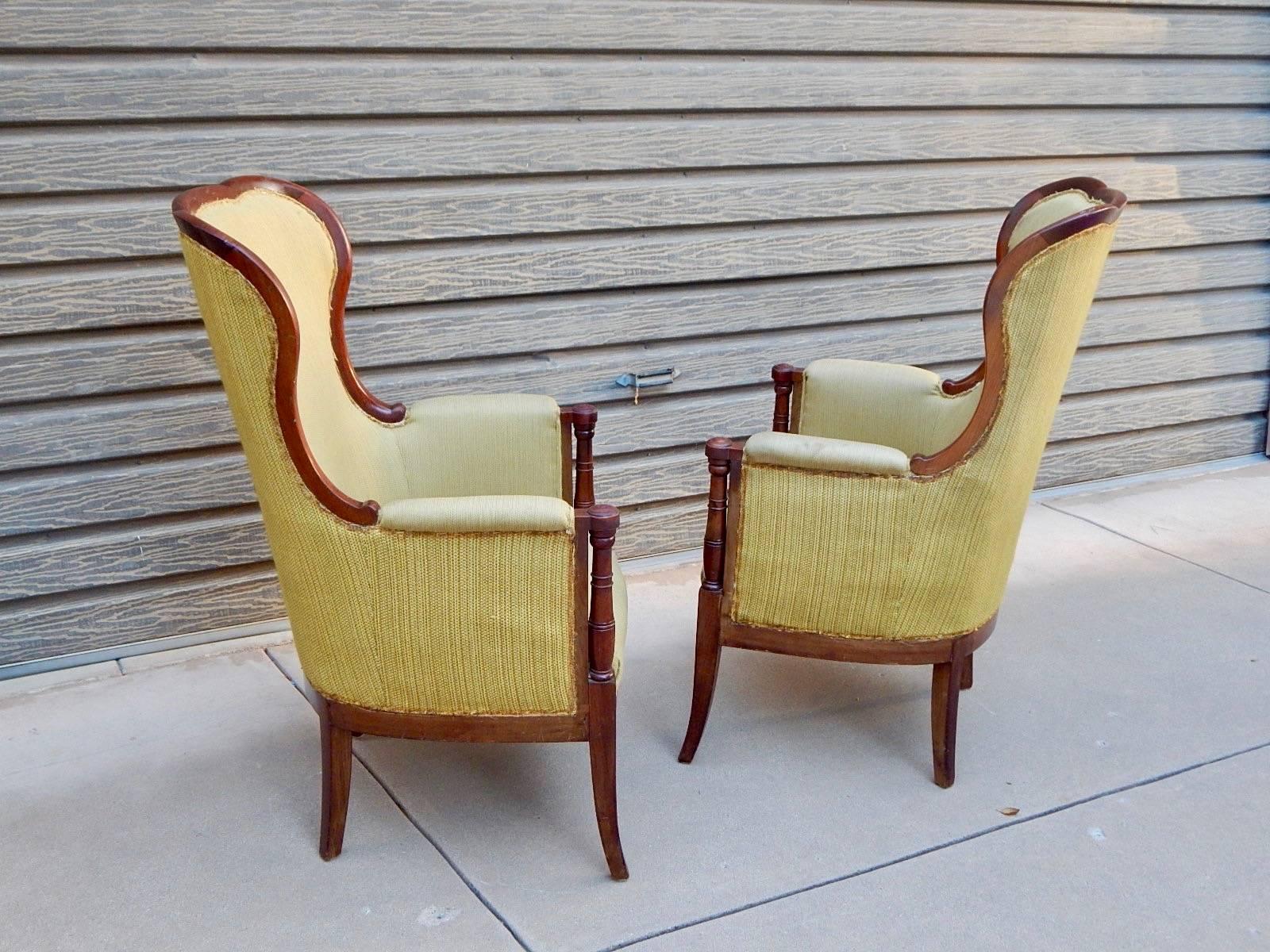 Early 20th Century Pair of Swedish 1920's Exposed Frame Winged Back Chairs in Mahogany For Sale