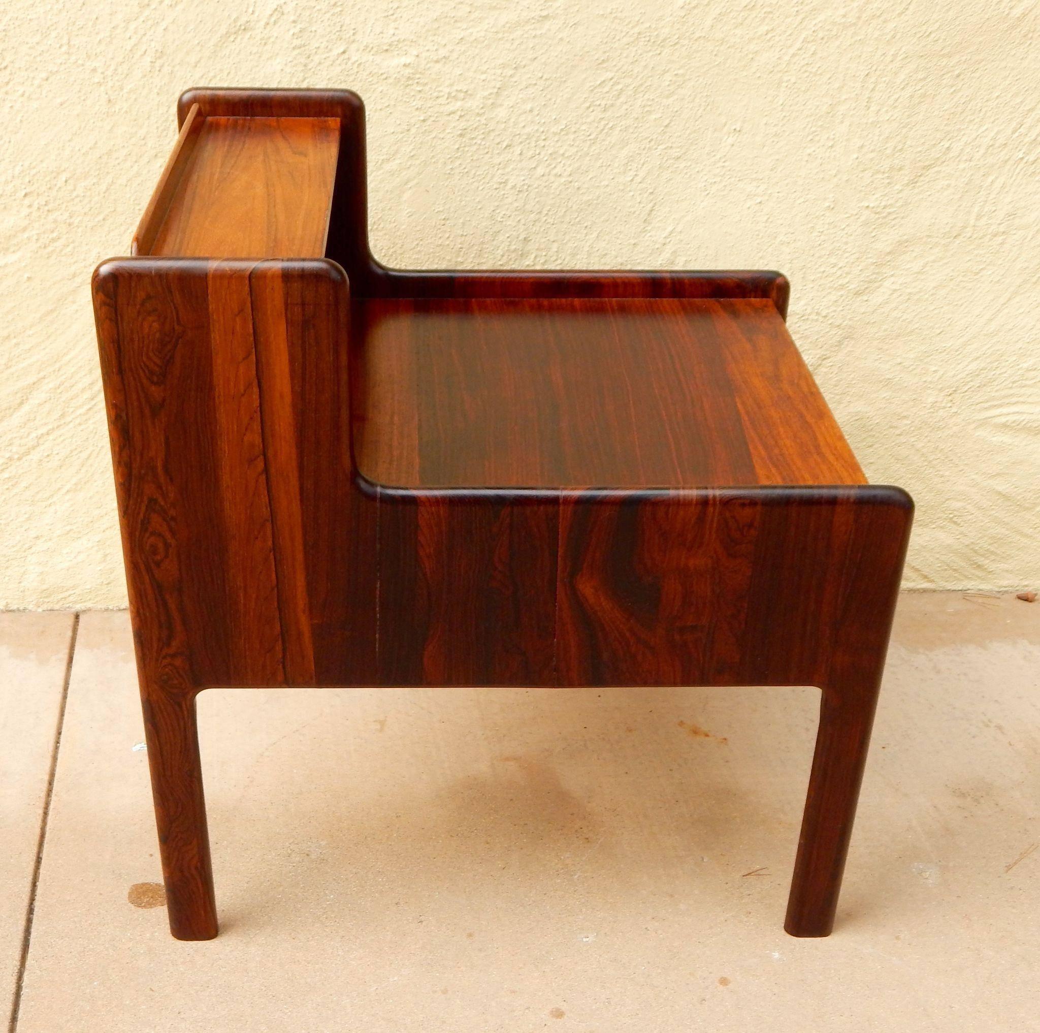 Danish Mid-Century Modern end table in rosewood with birch wood interior. Finger jointed drawers. Inset metal drawer pull, Denmark, circa 1960. Contact us with any questions.