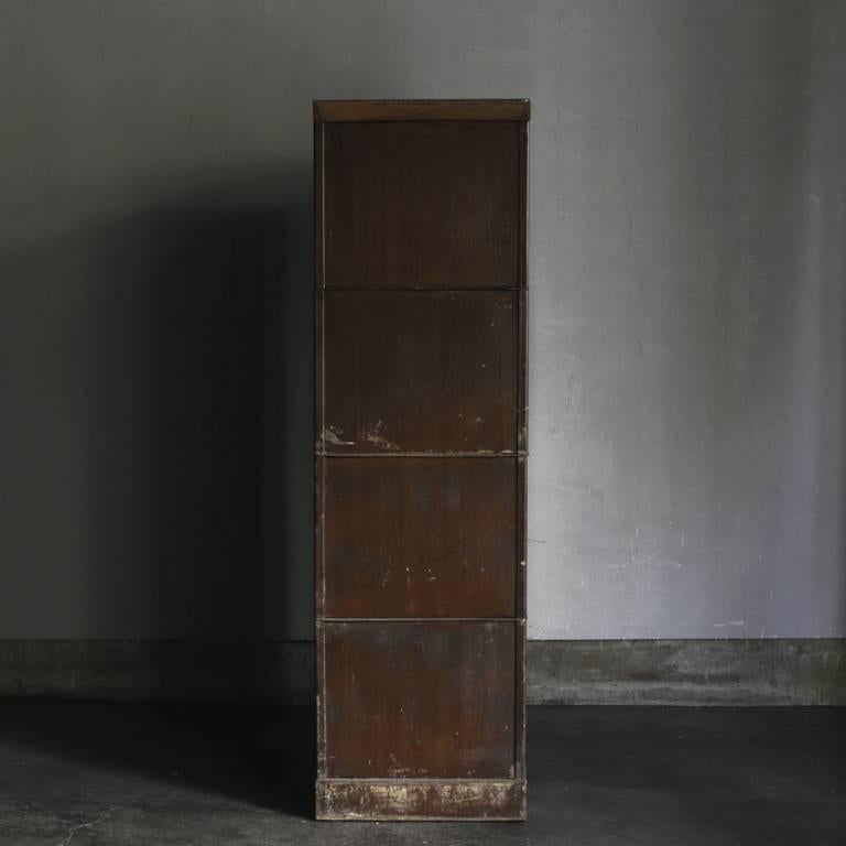 One of a kind metal case with four drawers. A steel case furniture originating from the Industrial Revolution in French. Rare, in great functioning condition, featuring the original metal emblem of manufacture 