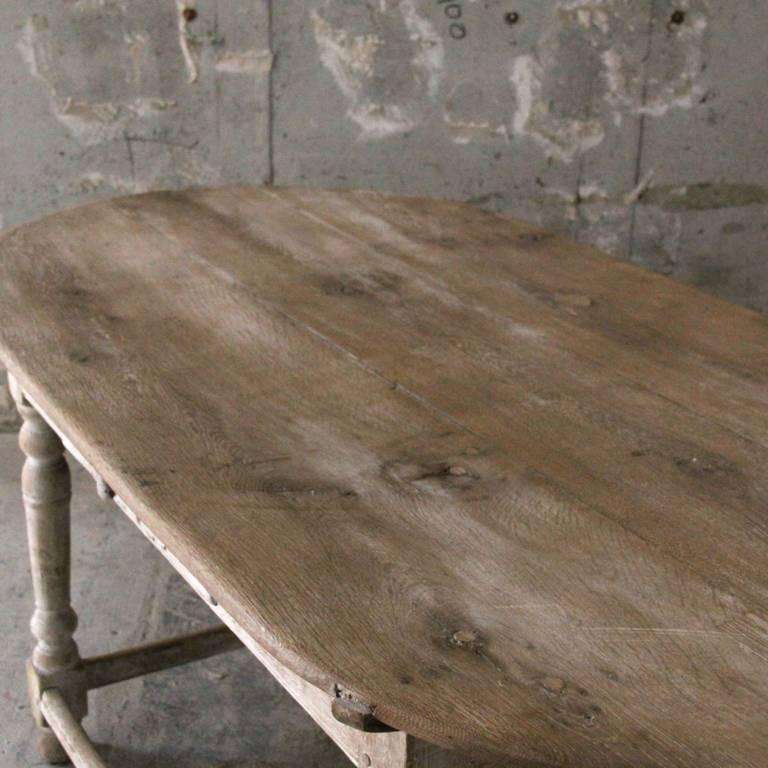 French antique table. Because it was used to wash the fabric, it is finished in a white and shabby texture. Exquisite antique items bringing sophisticated impression into space.