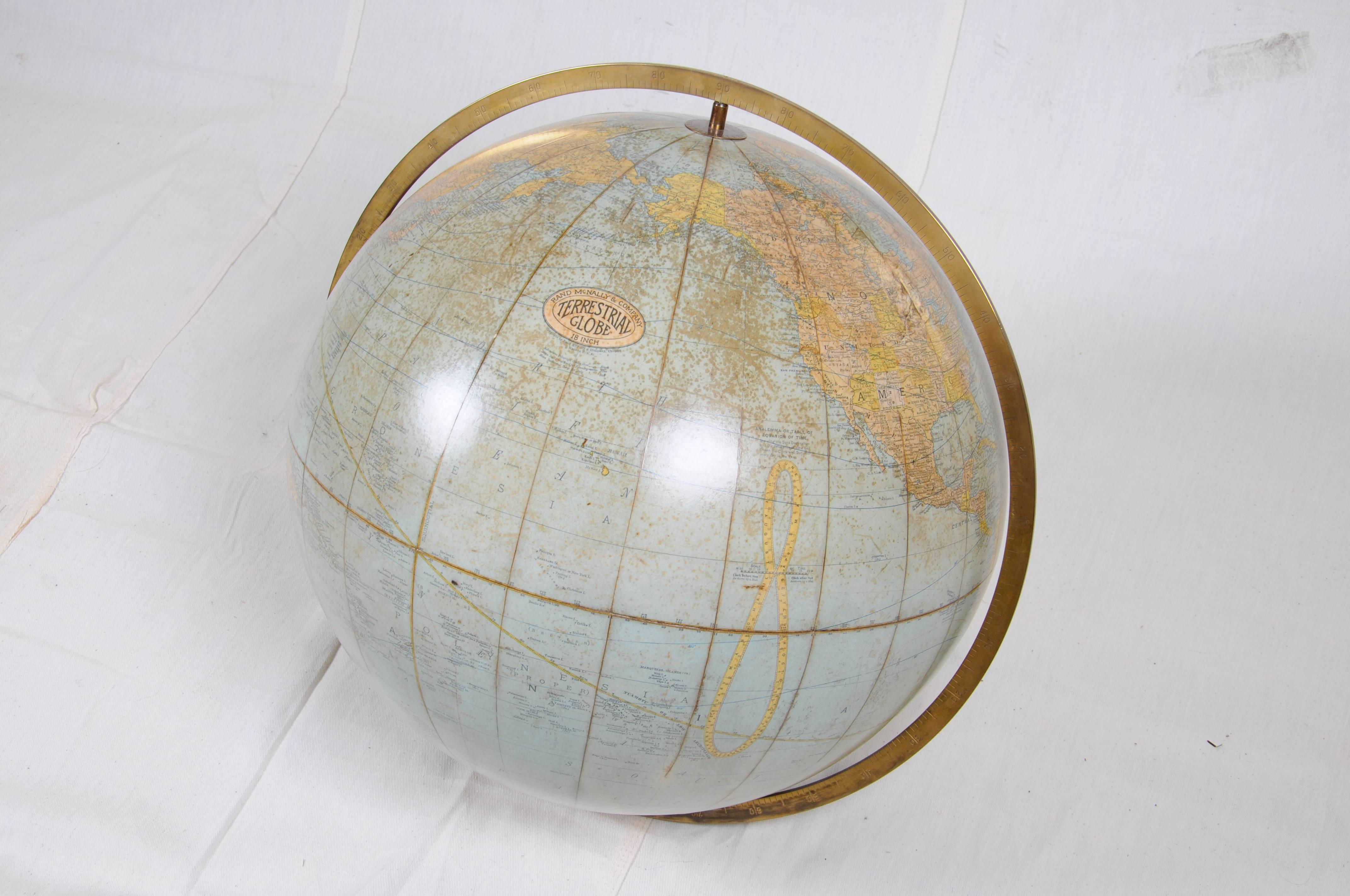 Rand McNally & Company
18-inch terrestrial floor globe
Chicago: circa 1924
Mahogany Jacobean style stand
Measures: 39.5 inches high
22 inches diameter, overall 

Condition: Globe and horizon generally very good with the usual toning, wear,