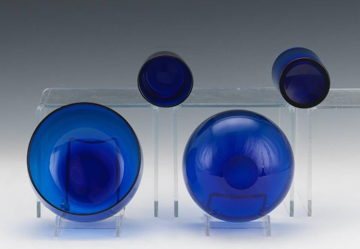 Rare set of six Baccarat caviar dishes and liners
Six cobalt blue bowls with caviar dish inserts. Unmarked. Each piece varies slightly in size due to handmade variances. Bowls measure approximately 3 ?