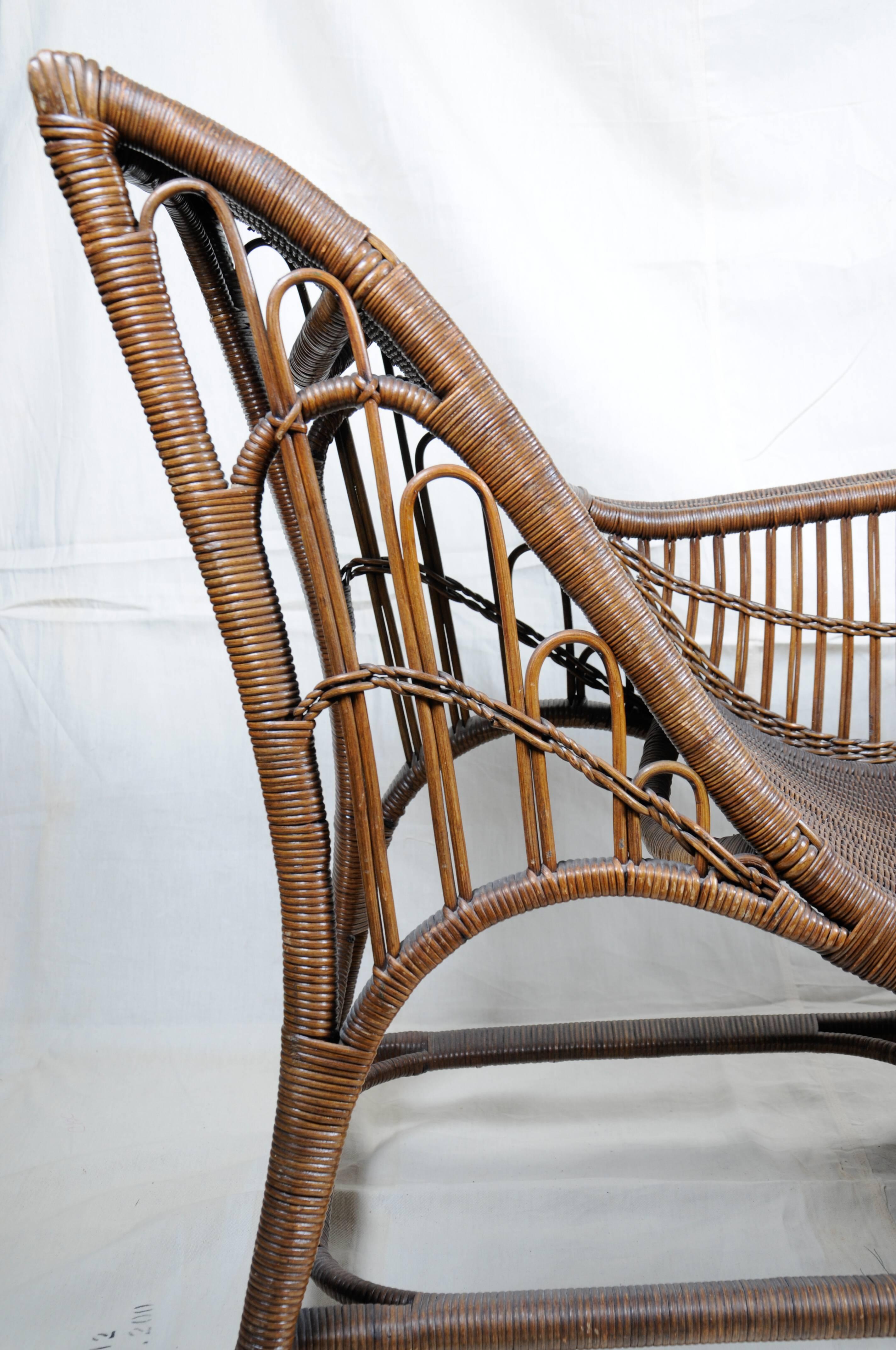 Wicker Chaise.
Chaise by Harry Peach Company, Leicester, England,
early 20th century.
Original logo designed by Paul Woodroffe.
Provenance: Charles Raymond of the Goodyear Tire Company.