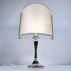 Italian octagonal table lamp made of solid 800 silver with a parchment paper shade.