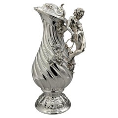 20th-century Italian sterling silver tonchon wine carafe with a handle shaped like a male figure