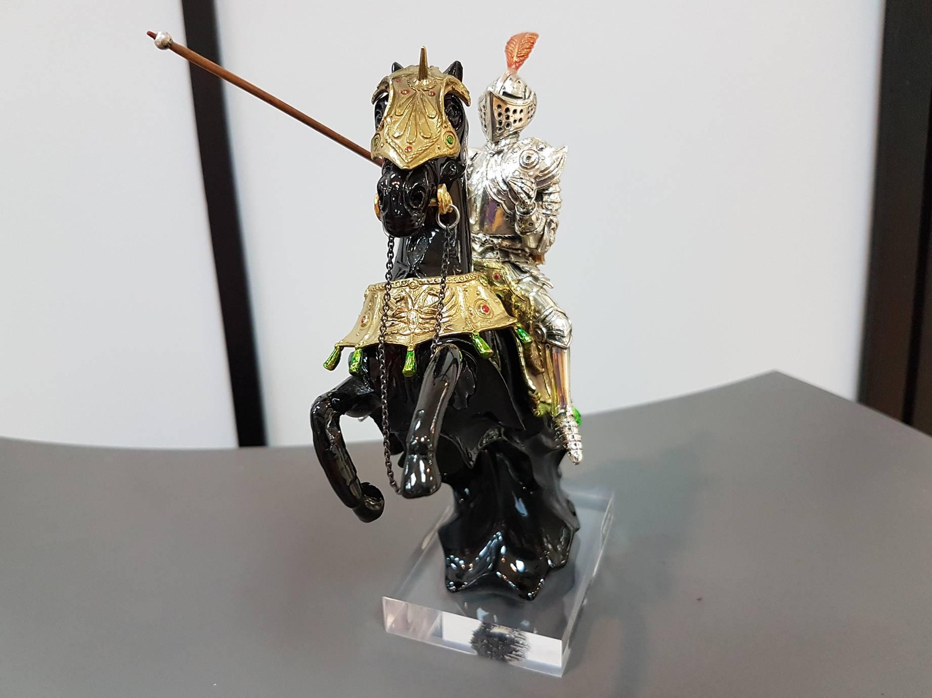 Horse in black lacquered resin with a sterling silver armor with Italian XIV Century Knight in sterling silver armor with golden and enamelled details.