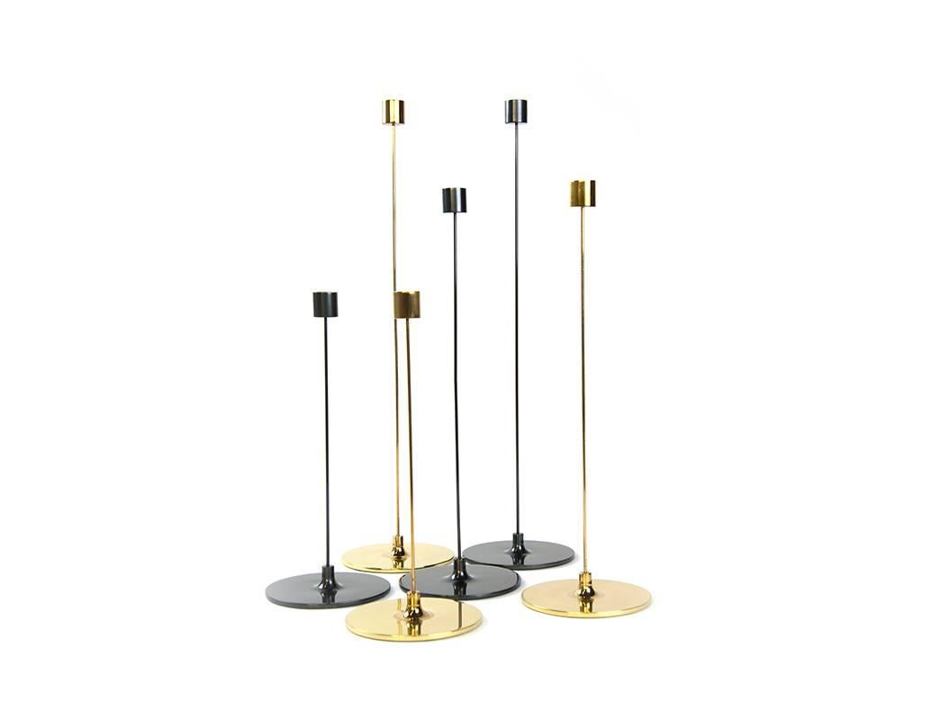 With an 12”, 16”, or 20” height, the candlesticks appear to almost float. Machined from solid brass both top and bottom, each one is hand polished and tarnished to just the right point of patina. These are both modern and traditional at the same