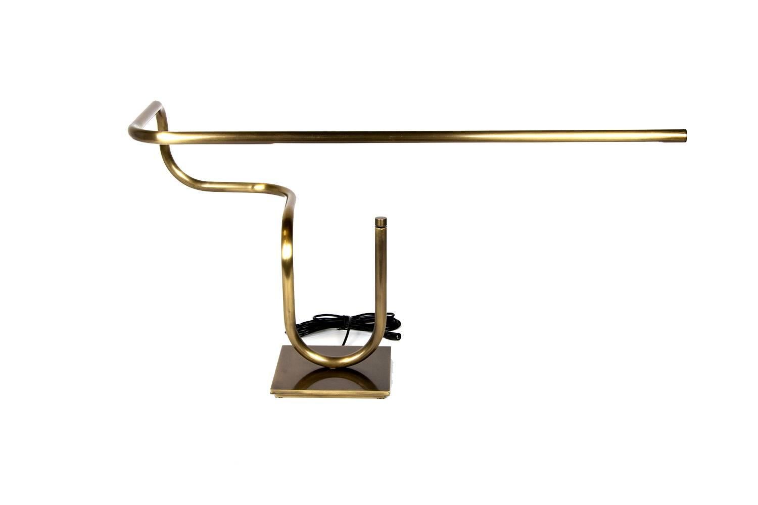 Inspired by the art of Sumi-e, Japanese black ink drawing, the lamp flows as if stroked in one consecutive line. The dimmable LED desk lamp is available in two finishes, darkened brass or tarnished brass, all handcrafted in Chicago.
*In-stock*