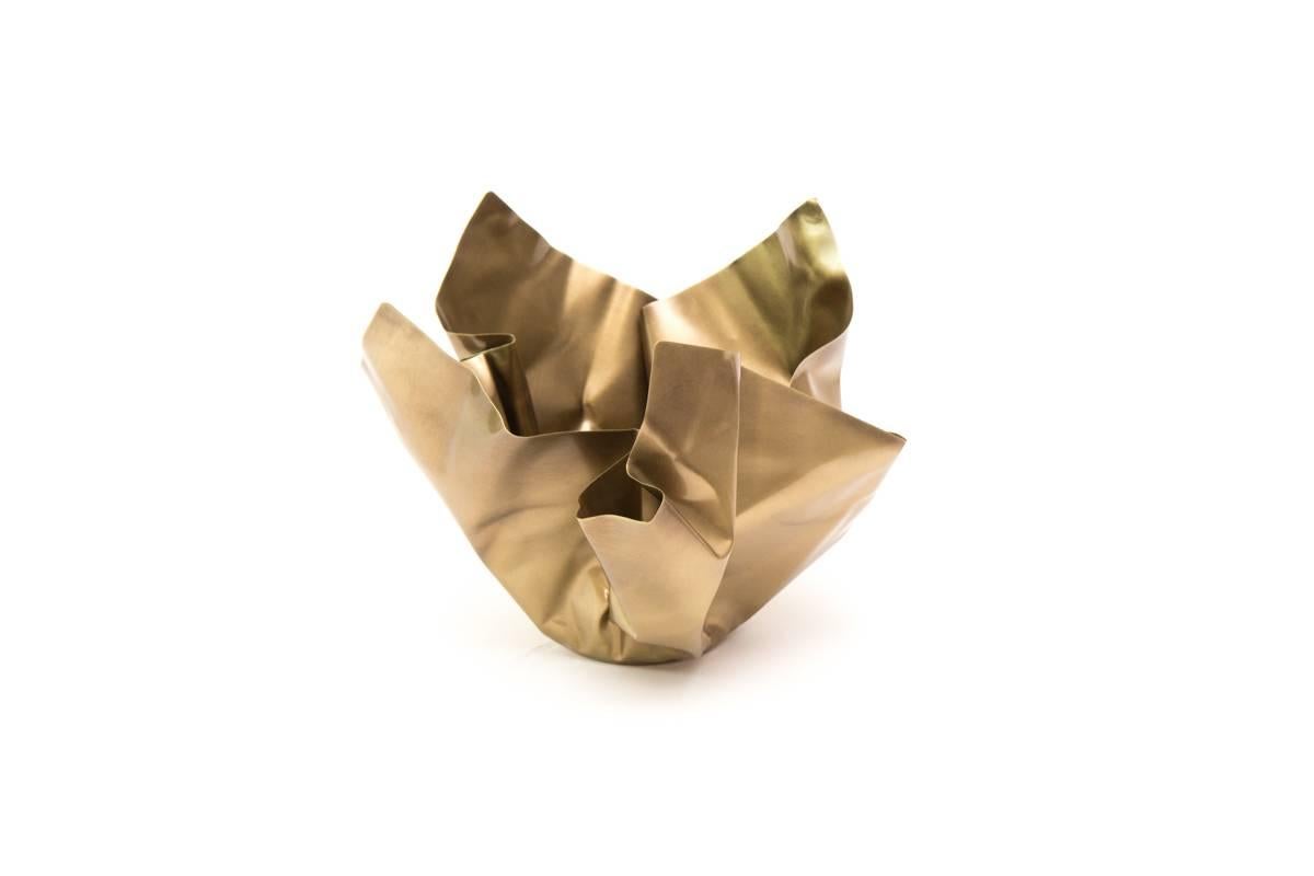 The Paper Series embodies the Idea of crumpling paper set in time. The materiality of the brass is utilized by the intricate folds and bends that not only resemble paper, but adds structure to the bowl. Each Paper is unique and hand sculpted in
