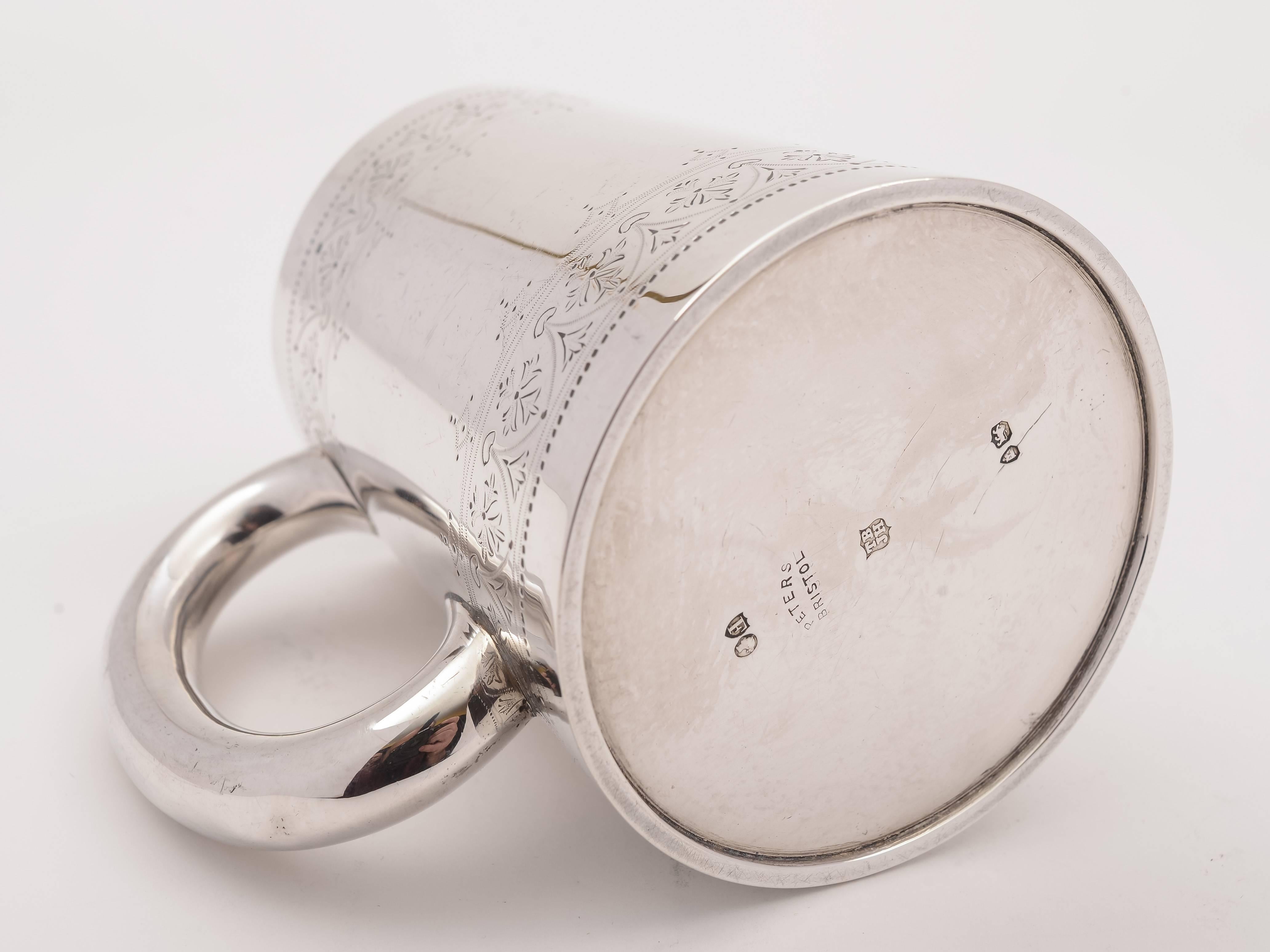 A good English Victorian silver pint tankard with lovely engraved decoration. Hallmarked London 1881 and marked 'T B J H' for the maker Thomas Bradbury & Sons. Though we only have one picture of the hallmarks, this does have a full set which can be