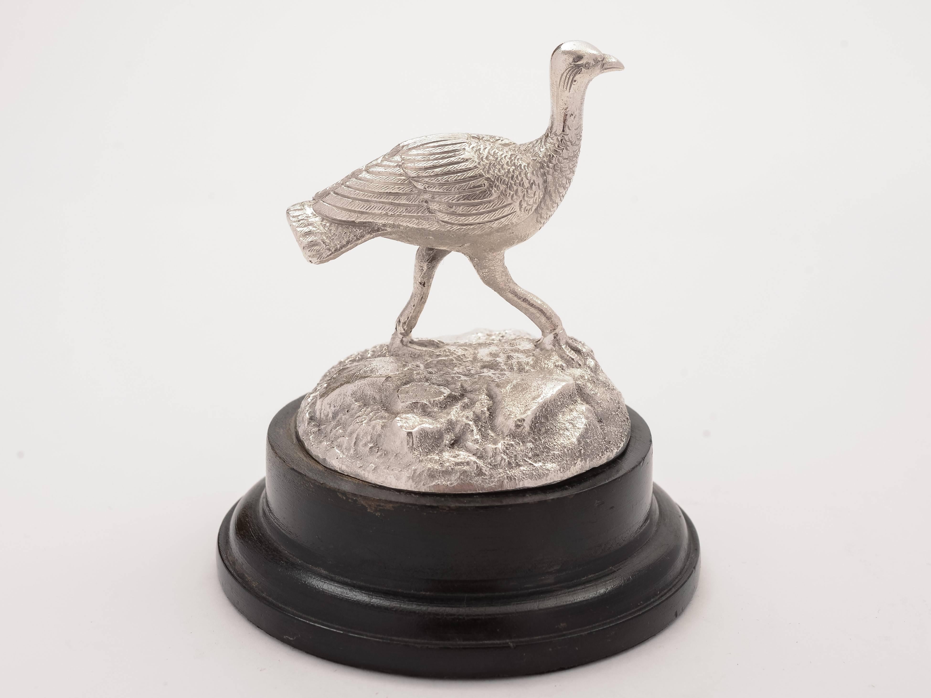 A nice silver plated emu trophy, nicely modelled, which sits on black wooden base with un-engraved plaque, circa 1910.

Measurements:
Height 3 3/4