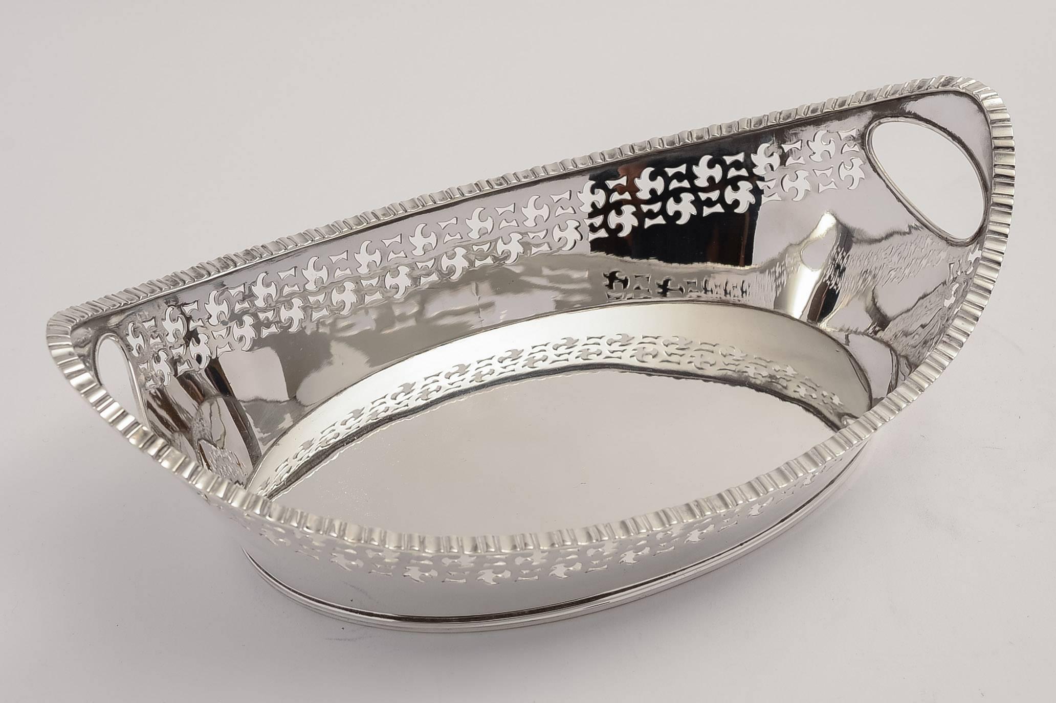 A lovely late Victorian silver plated bread basket with embossed edging and pierced cut-out design to sides, which could be modelled on birds in flight. It also has cut-out handles to each end, circa 1890.

Worldwide, first class, tracked and