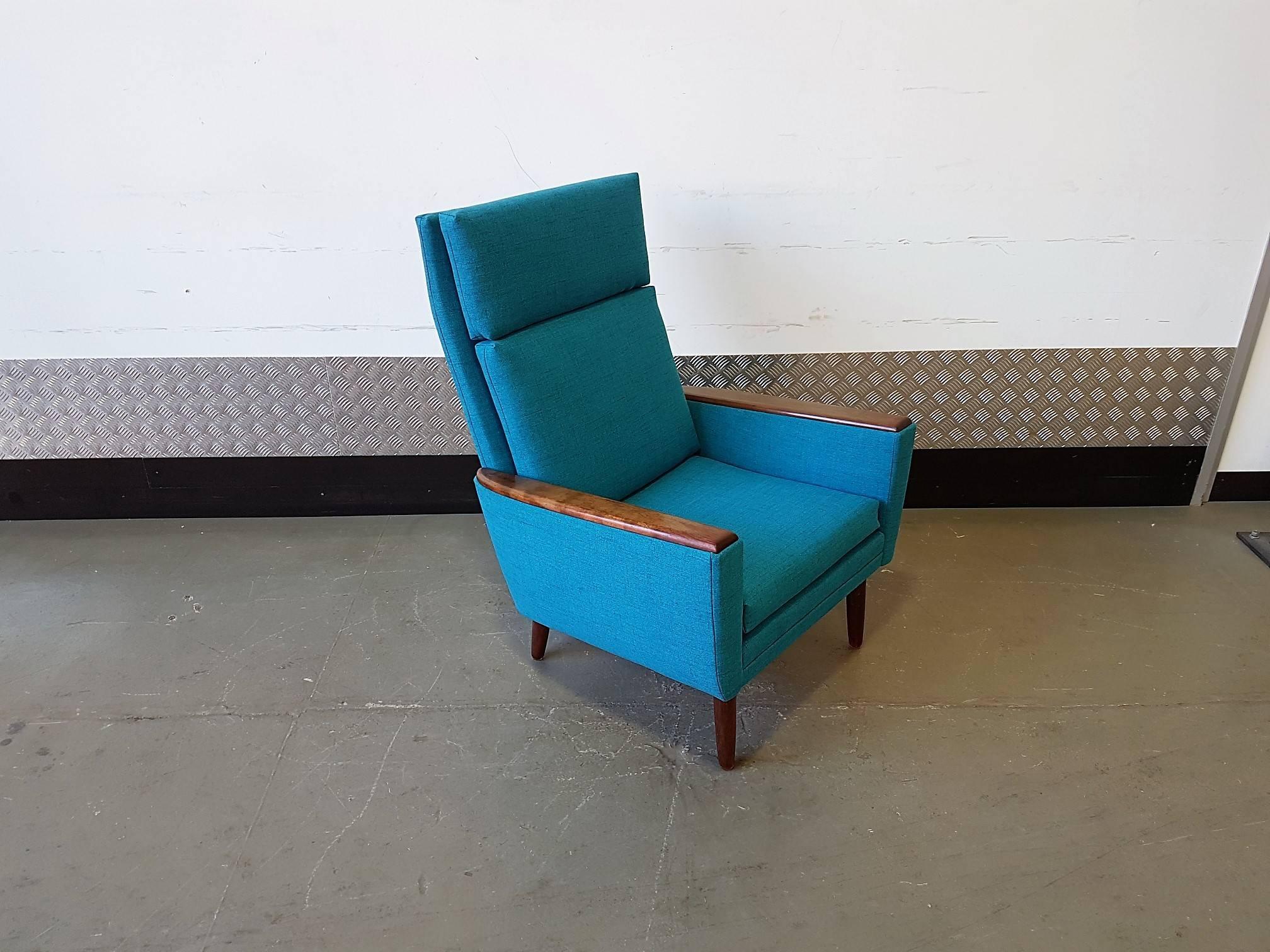 Danish high back armchair from 1960s went through a restoration process. Chair has been stripped down, new insides, new upholstery, cushions come with zips for easy maintenance. Wood is in excellent condition.

Fabrics used are the highest
