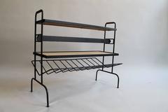 Combined Shelving/Magazine Rack by Jacques Adnet