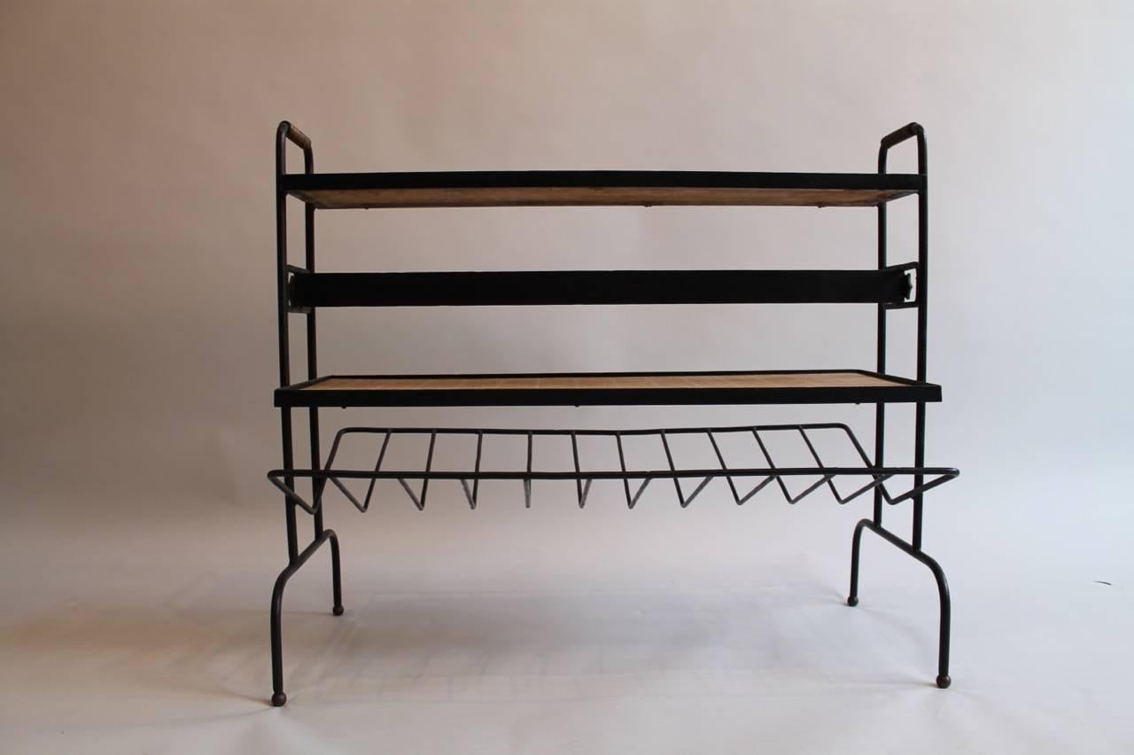 French Combined Shelving/Magazine Rack by Jacques Adnet For Sale