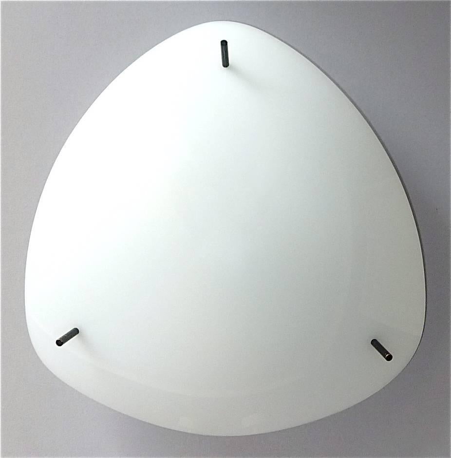 Attention: one flush mount is already sold, the other one with the barely visible flat dent is still available. The price is for one flush mount.
Pair of organic shaped midcentury acrylic ceiling lamps possibly designed by Gino Sarfatti and executed