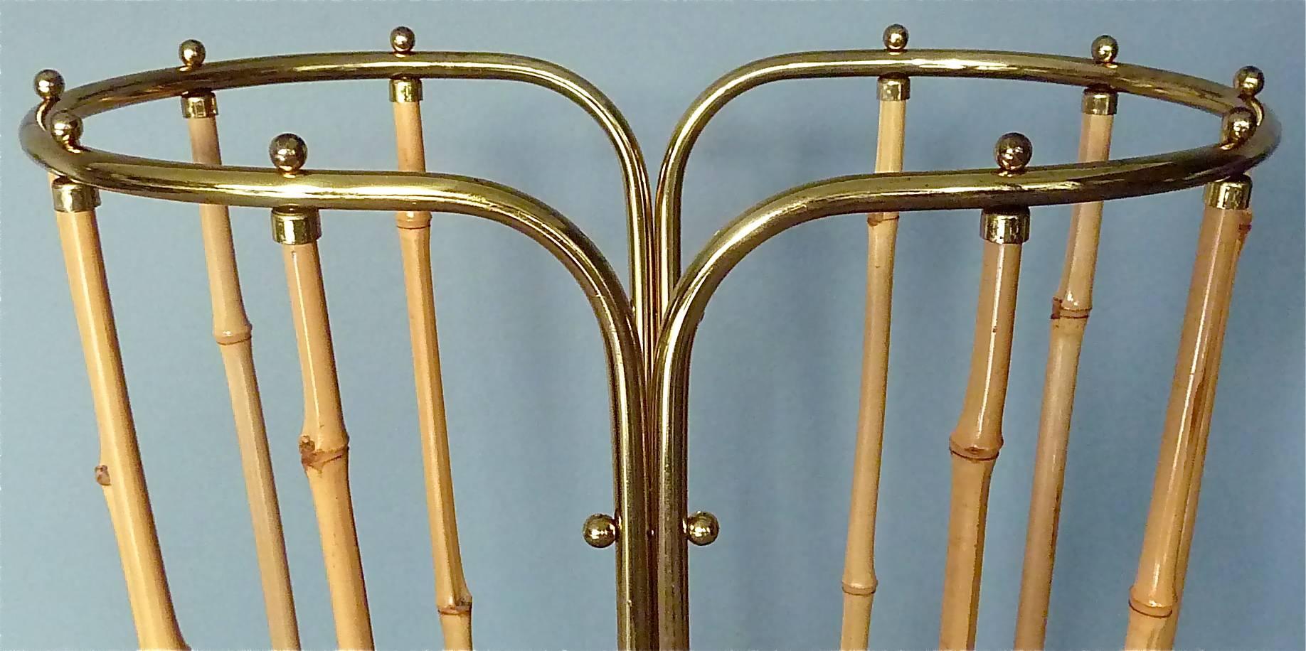 Exceptional 1950s Austrian modernist umbrella stand, which probably belongs to one of the wonderful designs by Auböck, Hagenauer, Josef Frank for Haus & Garten or Kalmar. It´s made of bamboo and tubular brass with lovely small ball screw nuts.