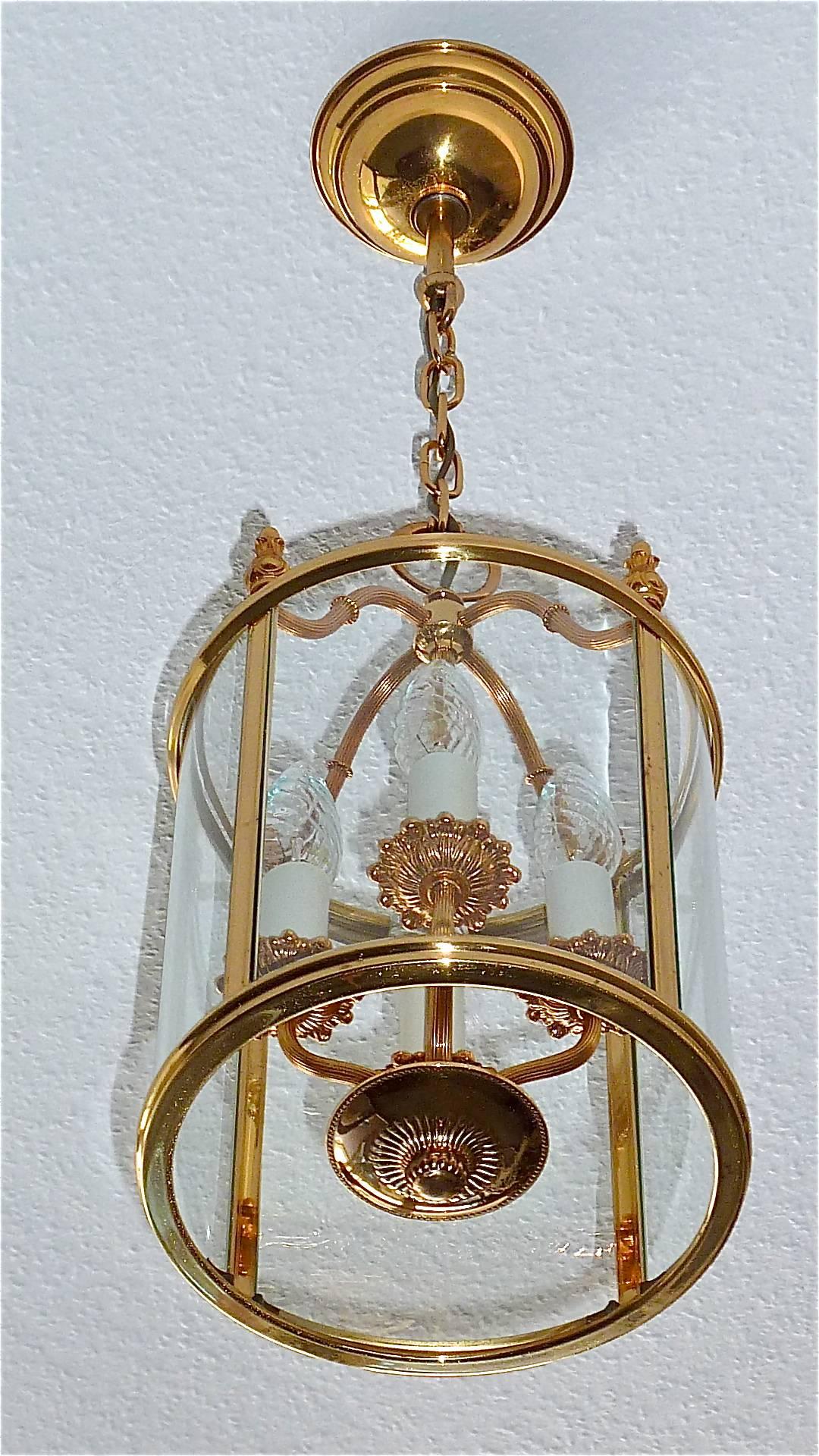 Signed beautiful gilt brass lantern or pendant lamp made by the Italian designer Gaetano Sciolari, circa 1960-1970 in Italy. The fabulous of vintage light takes four x E14 European standard screw bulbs to illuminate. The lantern looks like a