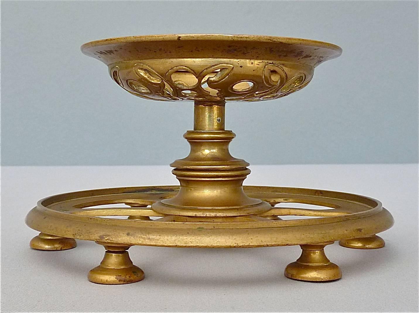 Very rare and fabulous of vintage pair of antique brass candleholder made by the exclusive company Lobmeyr in Vienna around 1890-1920. They have a great pattern in oriental style which was typical for the period of the Art Nouveau and Art Deco. The