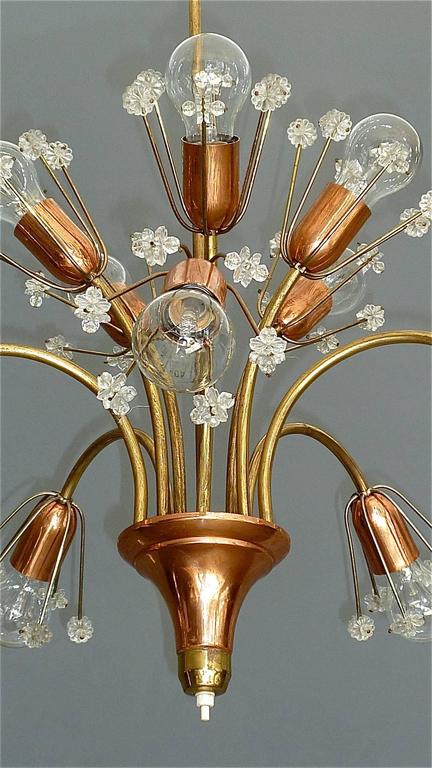 Beautiful and rare chandelier or pendant light in form of a bunch of flowers by Emil Stejnar for Rupert Nikoll, Vienna, Austria. An original midcentury vintage piece manufactured around 1950. It is made of brass, copper with a nice and typical