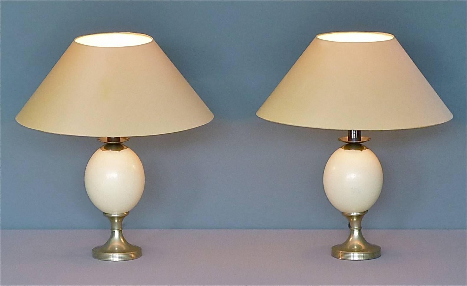 Pair beautiful silver plated ostrich egg table lamps signed by Anthony Redmile, England circa 1970s. The wiring, switch and plug are perfect so the table lamps are in fine working condition and ready to use. Both table lamps stay in a very good