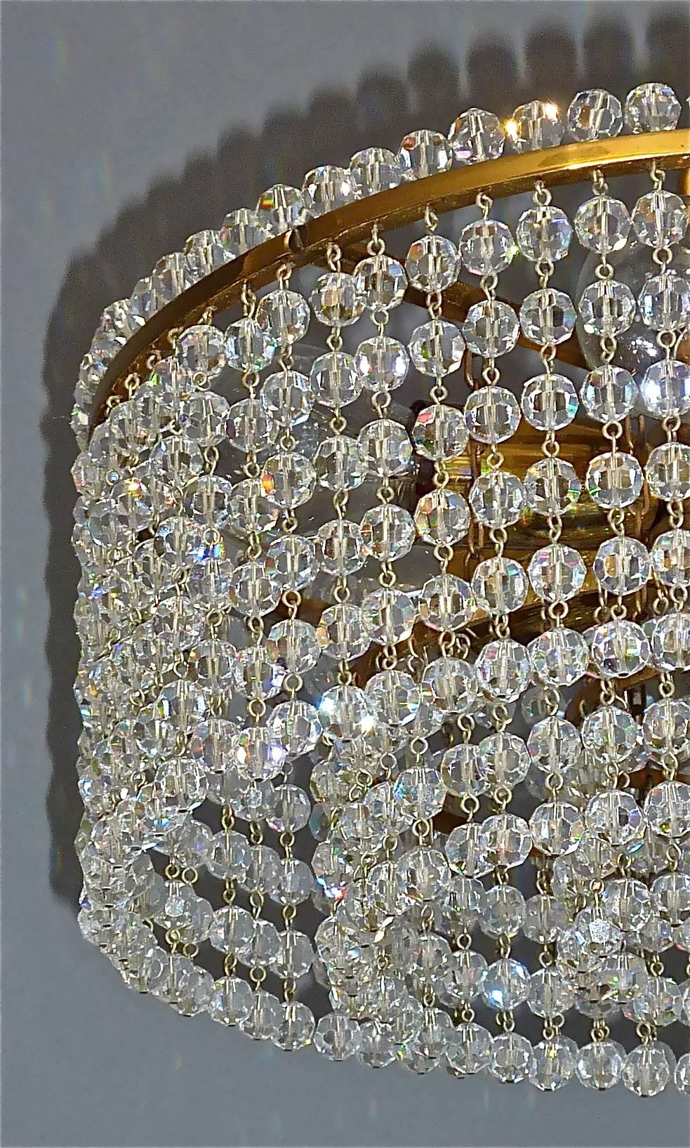 Austrian J.L Lobmeyr Chandelier Hand-Cut Faceted Crystal Glass Strings Brass Austria 1950 For Sale