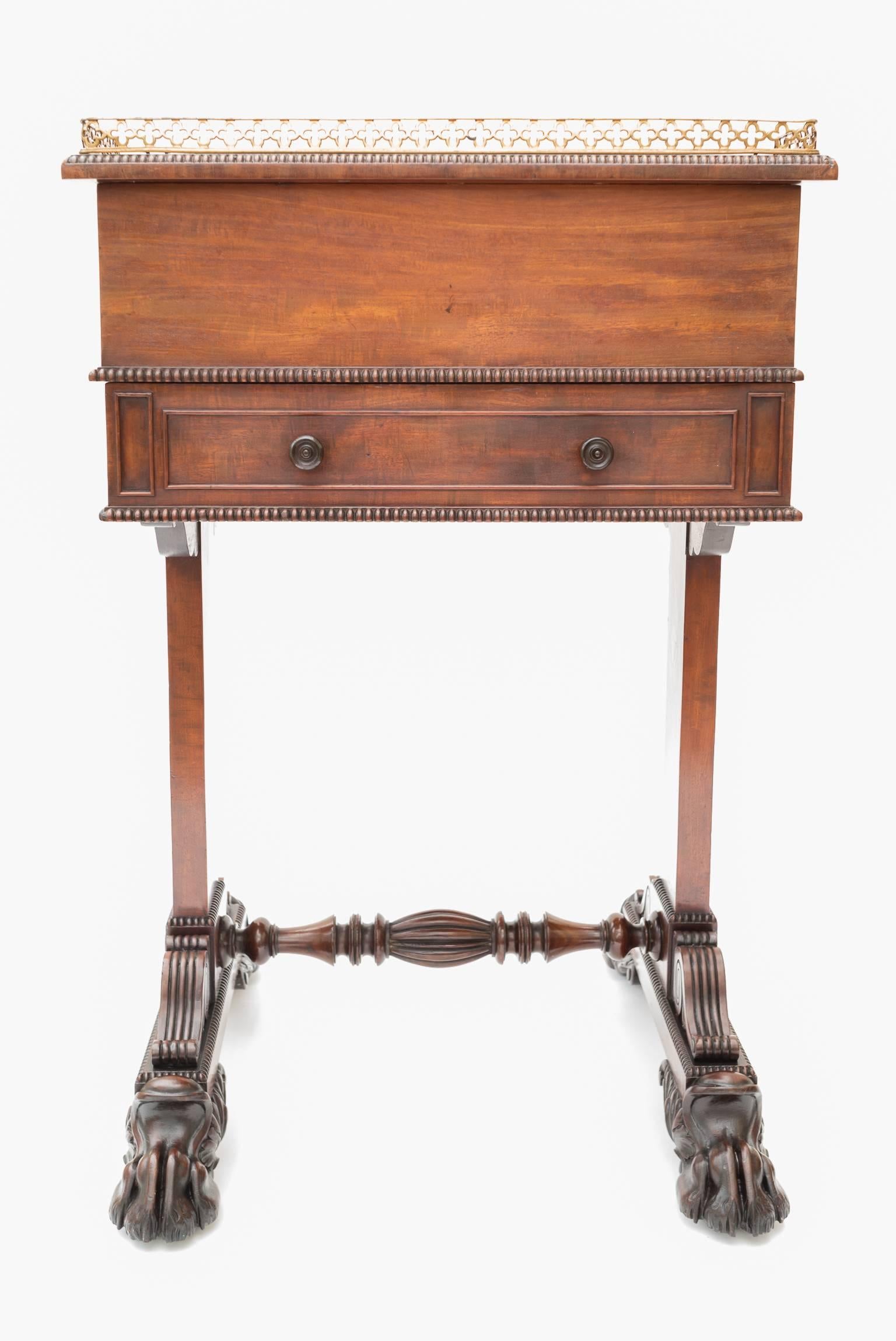 A fine Regency flame mahogany davenport
Attributed to Gillows, circa 1815
An unusual pattern with twin pedestal supports ending with claw feet.
Pull-out slide to three sides and a draw to the front.
Label inside front draw
W.J Mansell
Cabinet