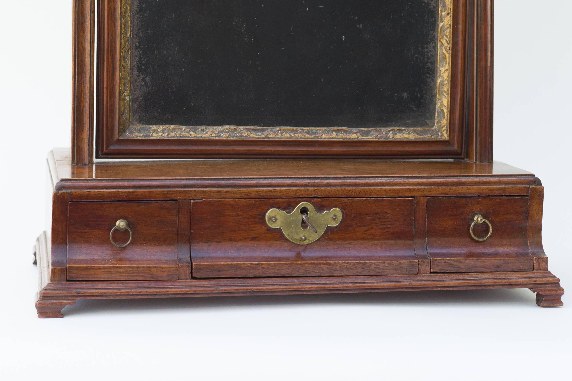 George II period mahogany dressing table mirror with bevelled glass
With three oak lined draws below,

circa 1740-1760.