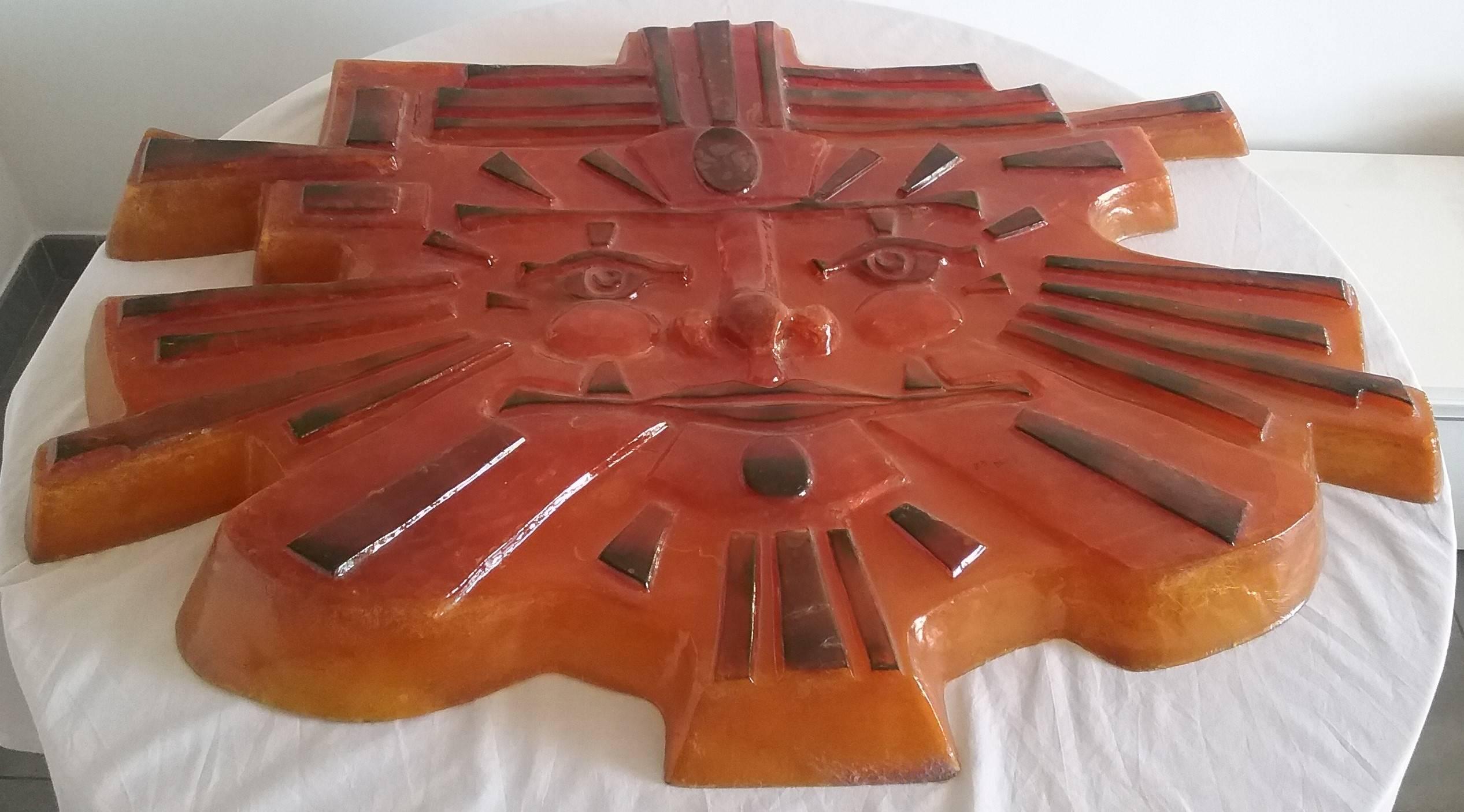 Ornamental wall sculpture signed ES MATTIUS
This artist exposed at Vallauris, French Riviera in 1970s
The wall decoration represents a sunny face or a smiling sun.
Several more or less dark orange colors are present, aspect cracked on the whole
