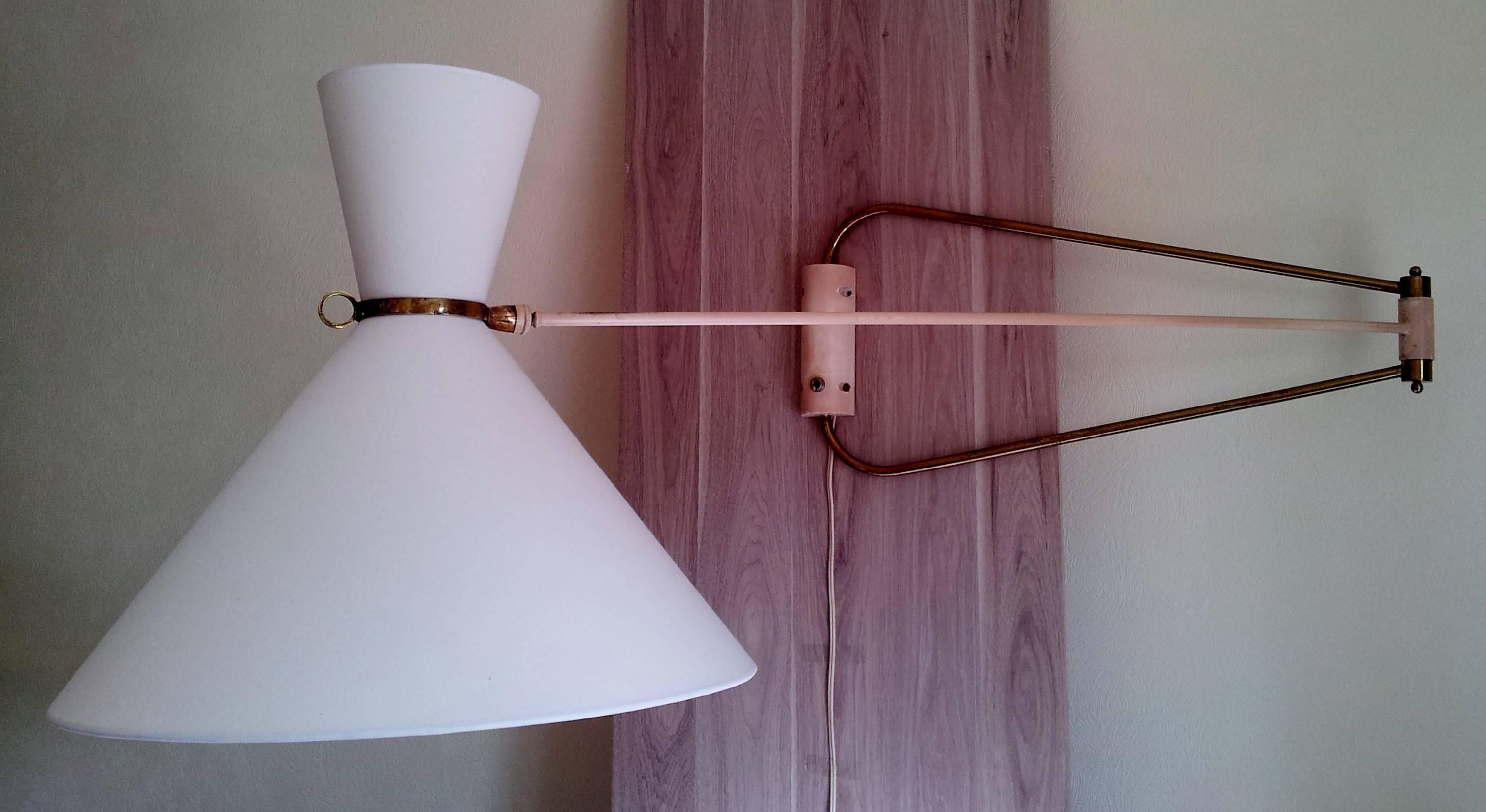 Authentic double swing arms wall lamp designed by Robert Mathieu (1921-2002) I 1951 to 1954.
Edition R. Mathieu 