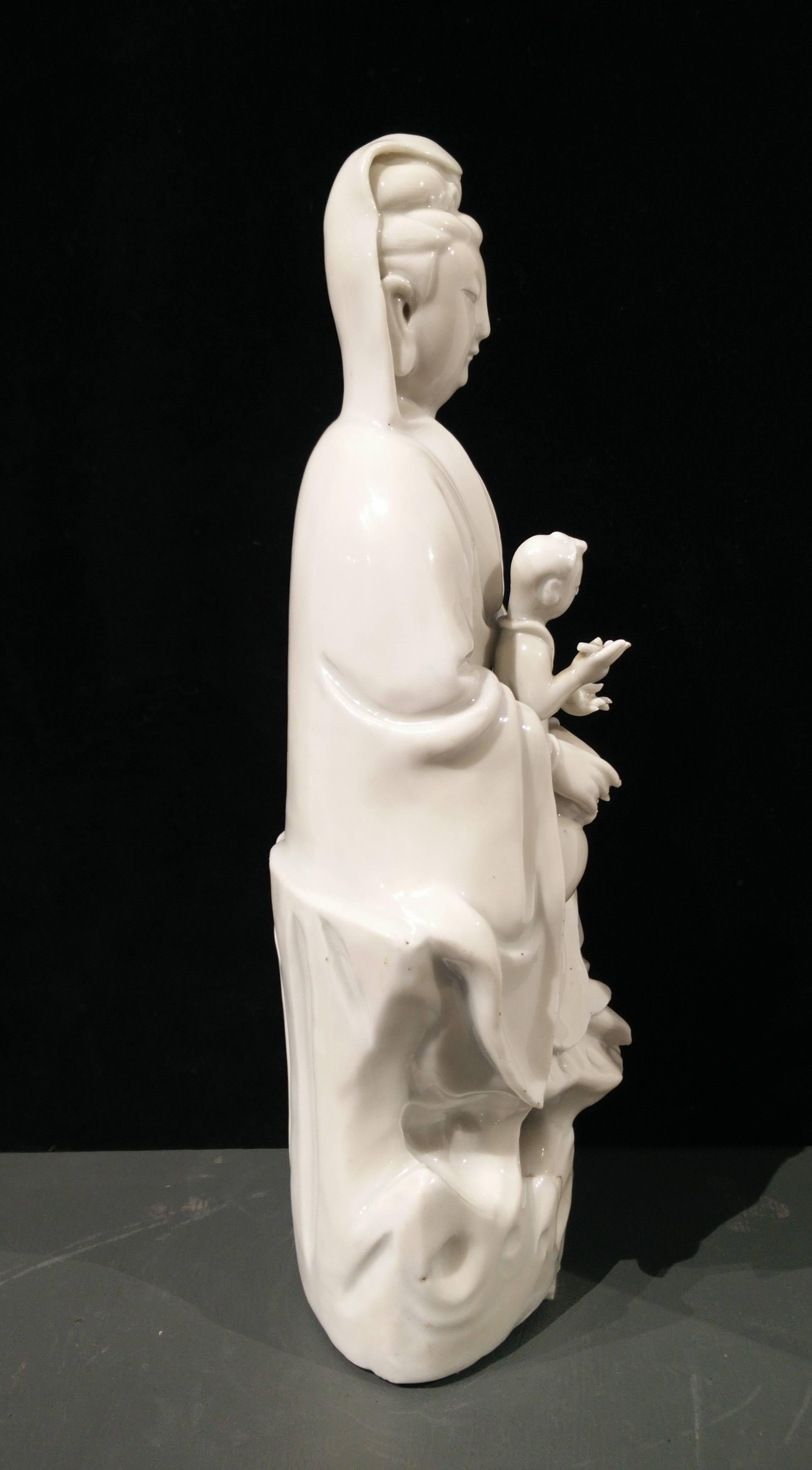 Qing 18th Century Chinese Blanc-de-Chine Porcelain Figure of Guanyin with Child For Sale